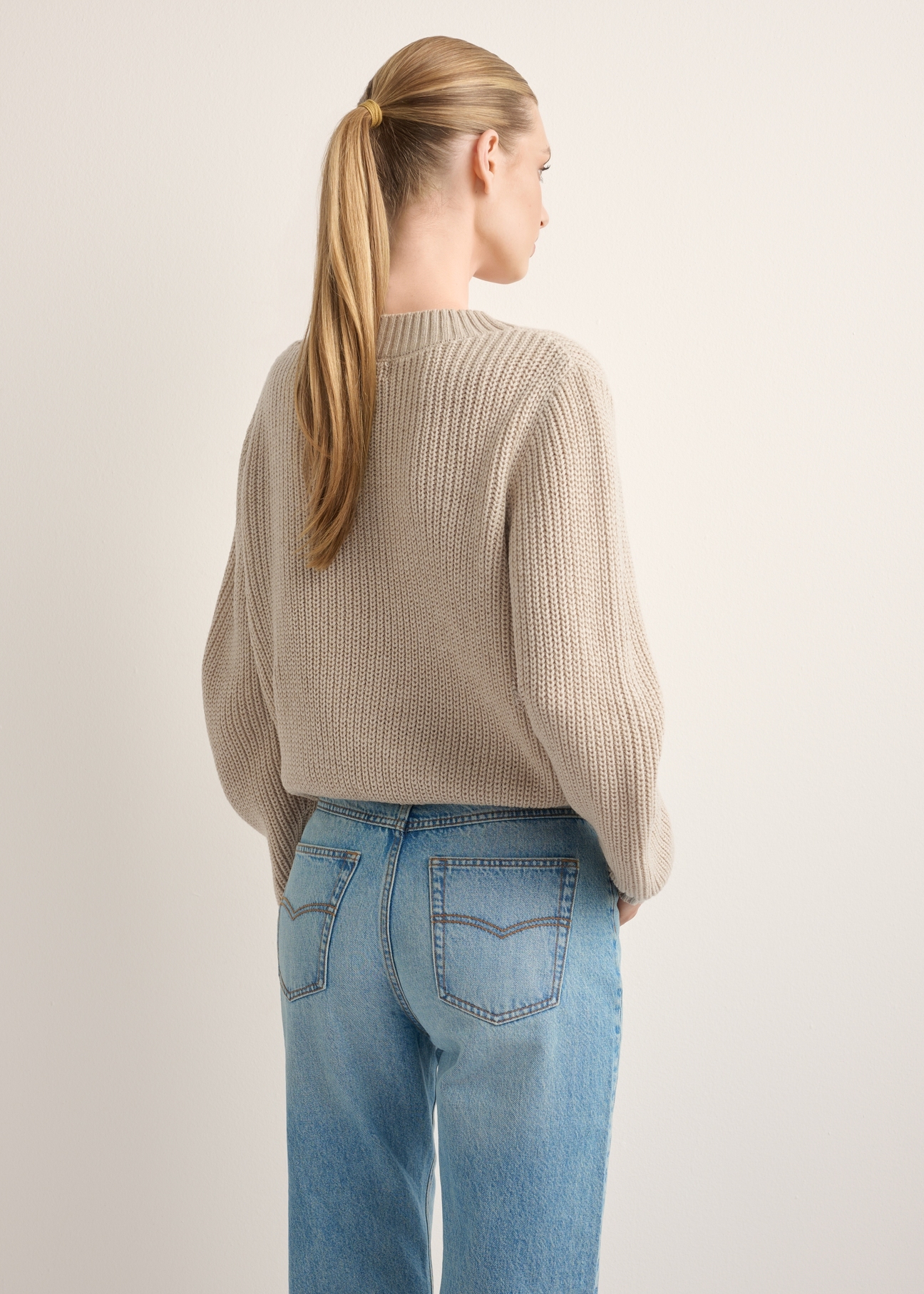 Women's sweater in cool beige SWEDT-0162-1J(Z26), back view of the product on the model. Half of the silhouette visible.