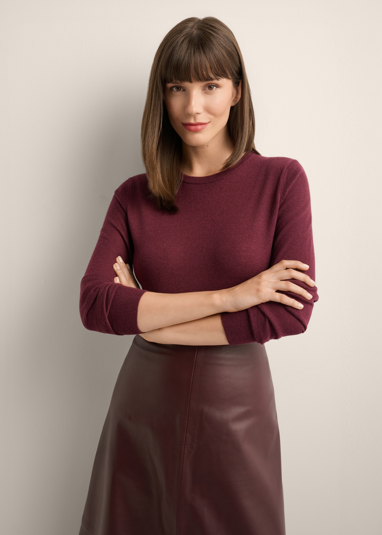 Burgundy wool sweater SWEDT-0267-4D(Z26), front view of the product on the model. Half of the silhouette visible.