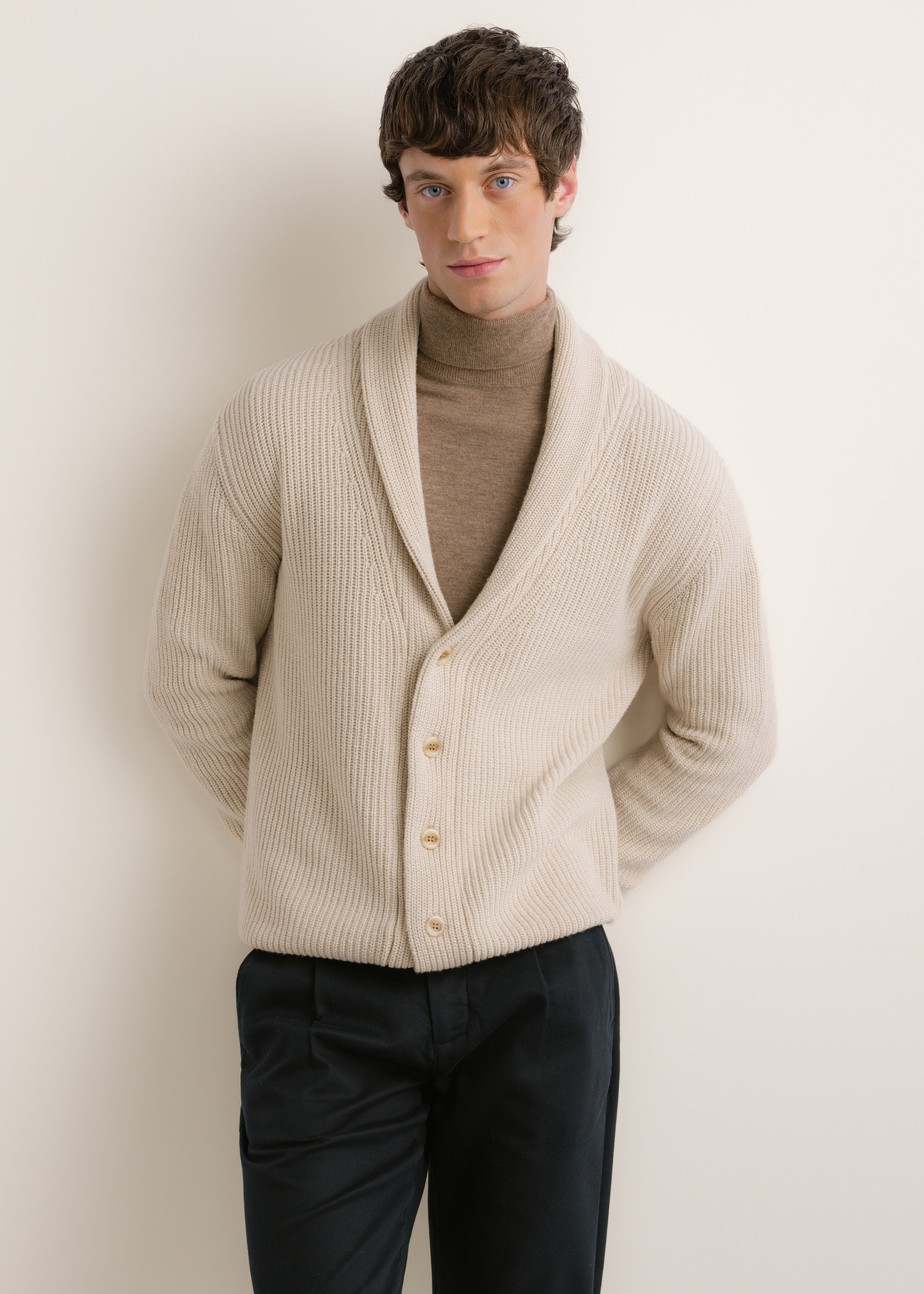 Light beige men's cardigan KARMT-0006-1A(Z26), front view on a model. Half of the figure is visible.
