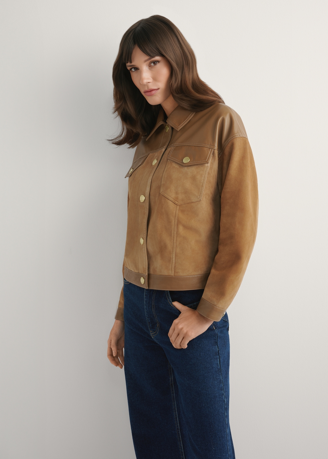 Beige women's leather jacket KURDS-0572-1B(W26) - side view of the product, against a light background. Half of the silhouette visible.