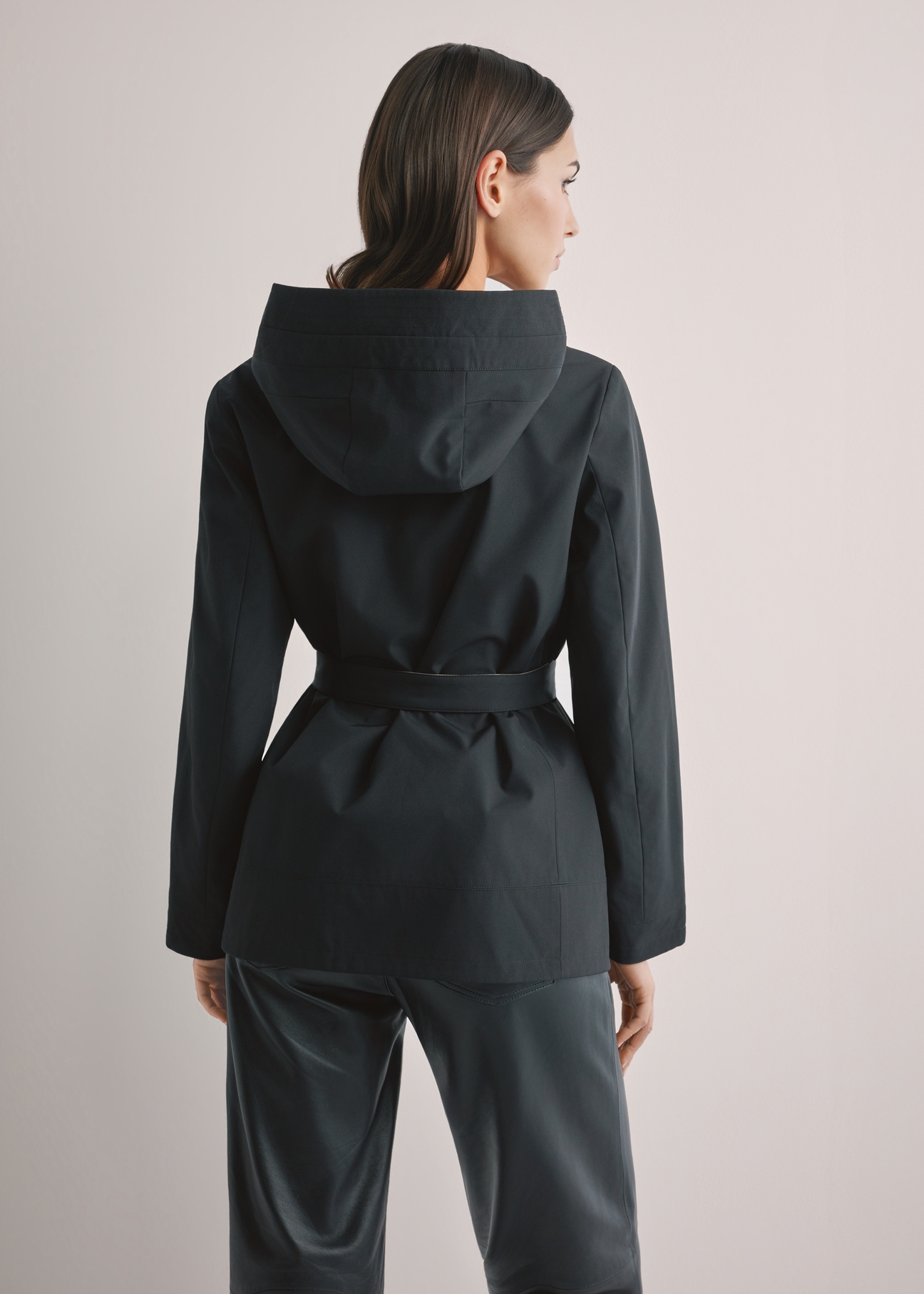 Women's reversible transitional jacket KURDT-0655-9J(W26), product view from the back on the model. Half of the silhouette visible.