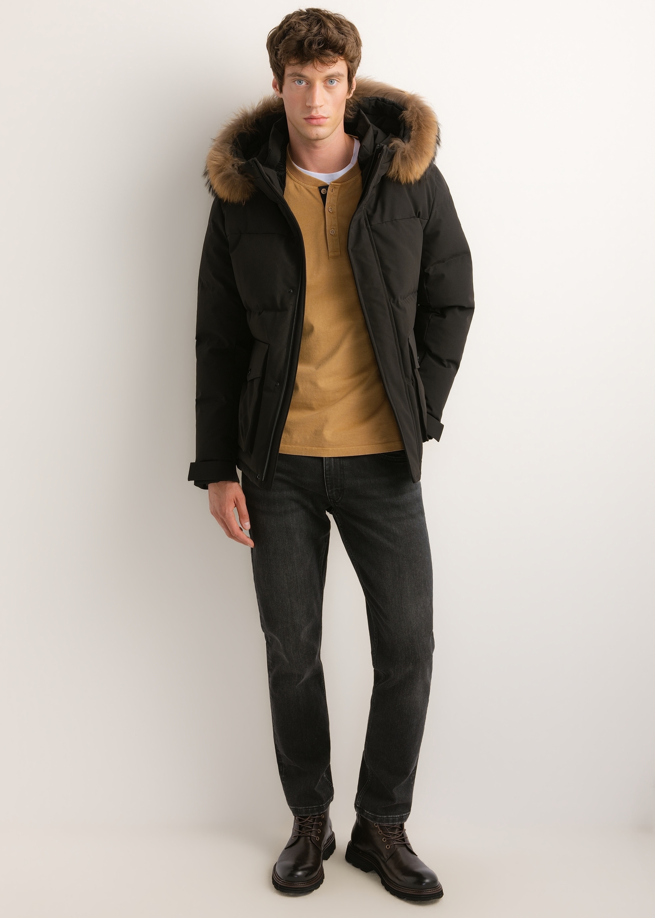 Men's black winter jacket KURMT-0434-99(Z26), front view on a model. Full-body shot.