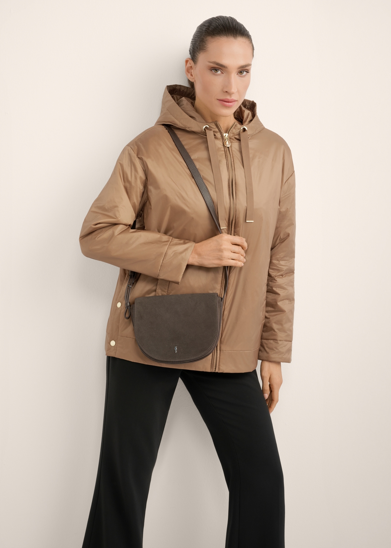 Women's brown suede messenger bag TORES-1398-1F(Z26), product view on model's shoulder. Half silhouette visible.