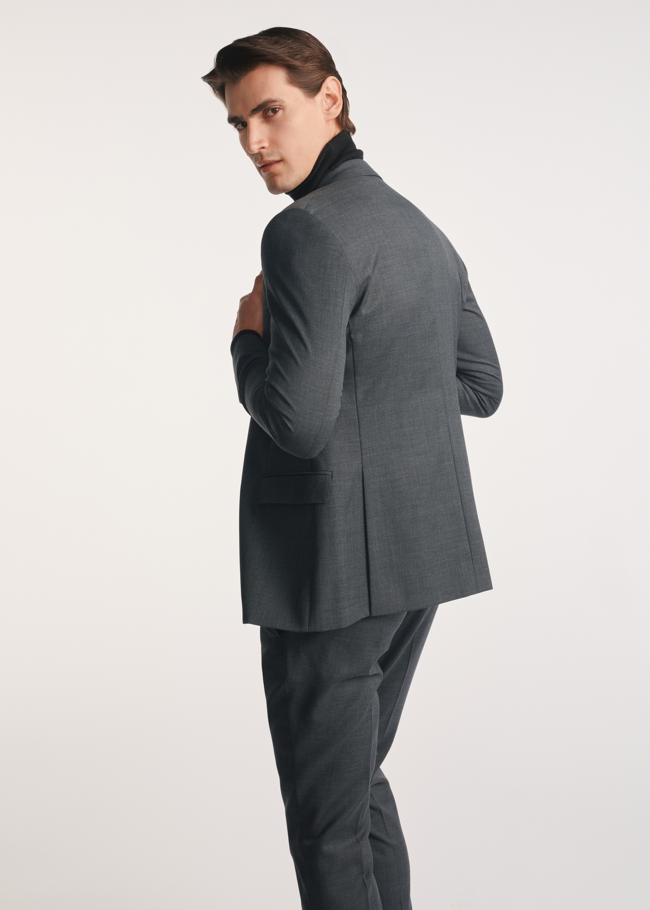 Men's jacket in graphite color MARMT-0018-95(Z25), view of the product from the back on the model, half of the silhouette visible.