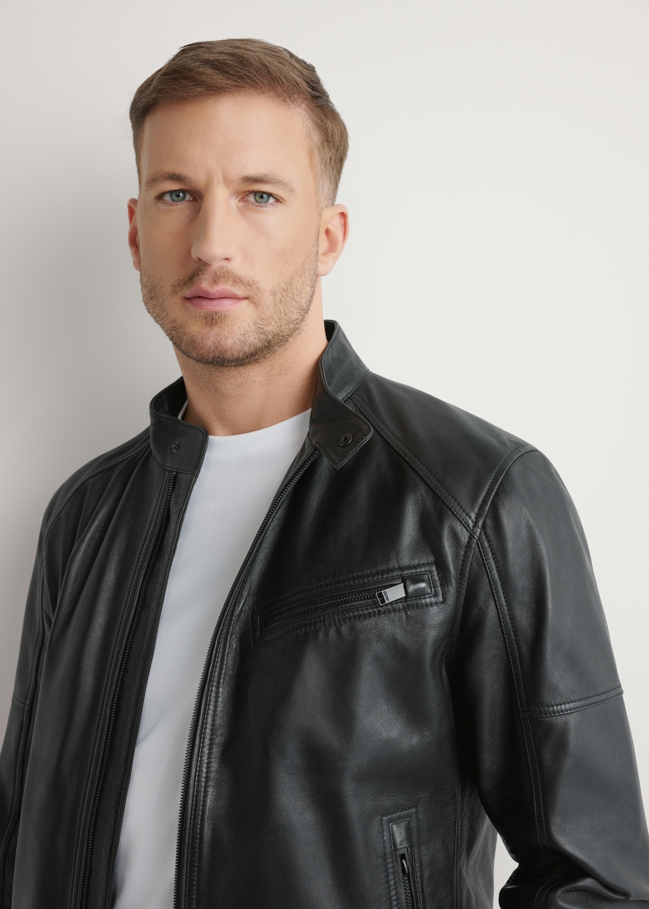 Black men's leather jacket KURMS-0400-99(W26), close-up of the product on the model's silhouette.