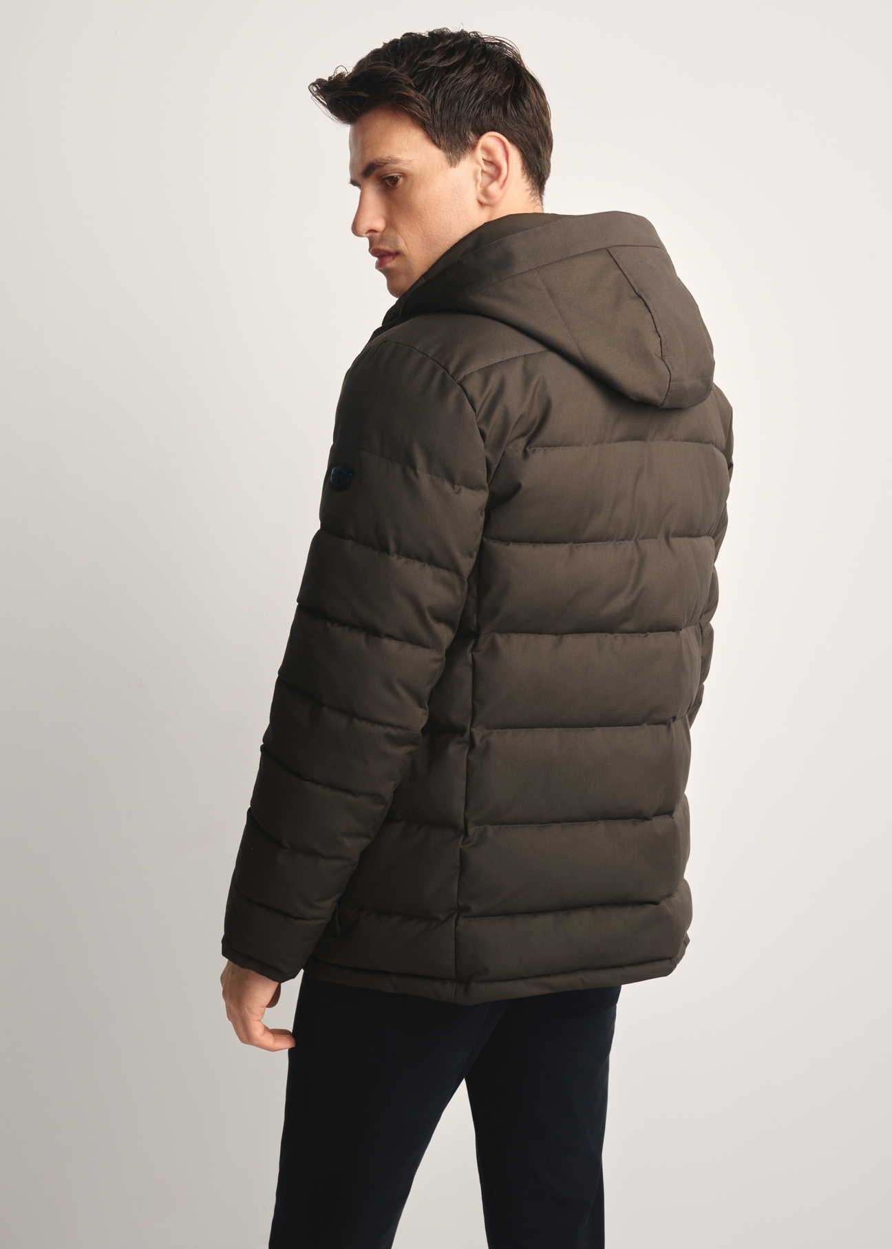 Men's olive winter jacket KURMT-0379-57(Z25) - product view from the back of the model against a white background. Half of the silhouette visible.