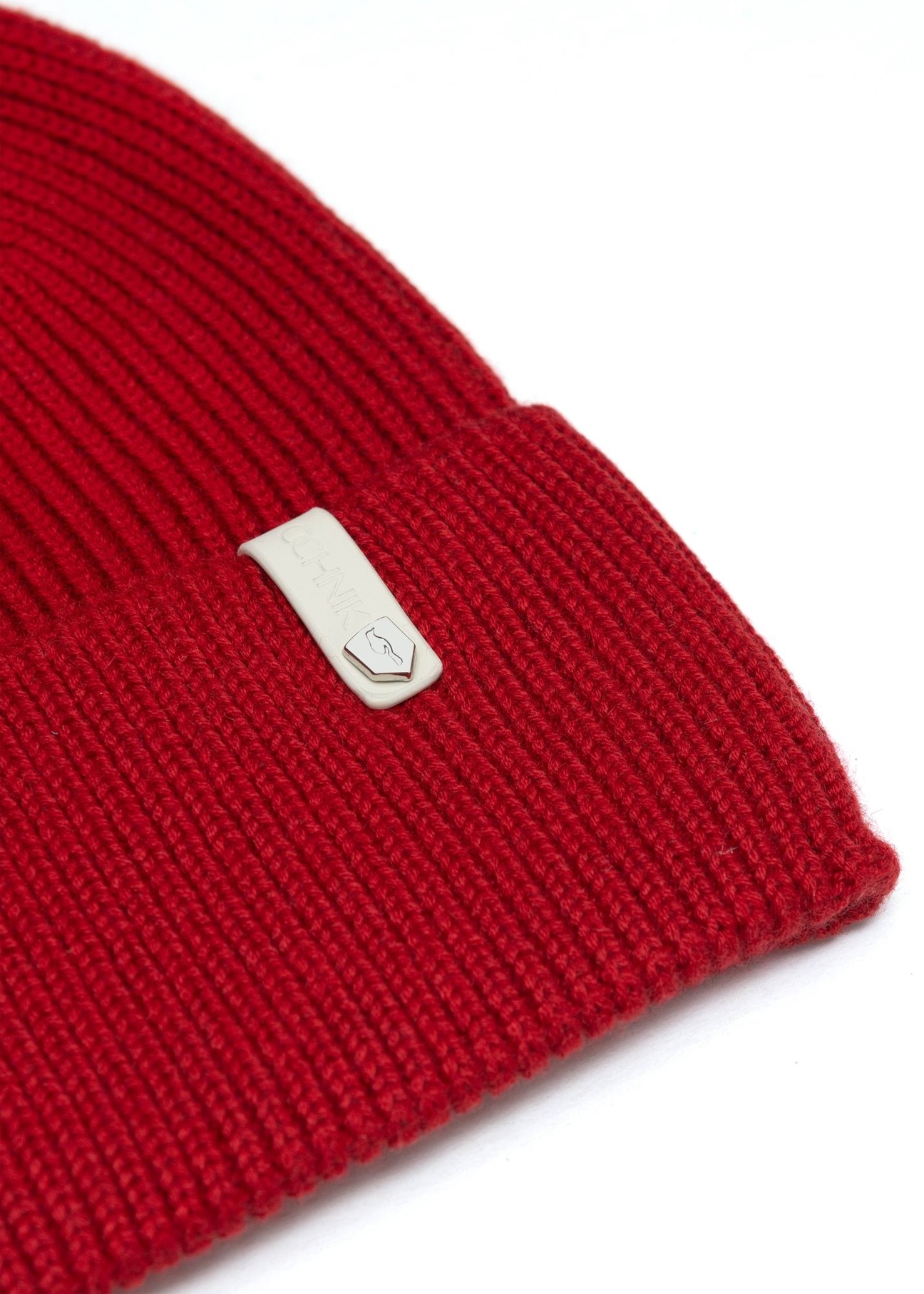 Red women's hat with merino wool CZADT-0178A-4B(Z26), close-up of the product detail, view on a white background.