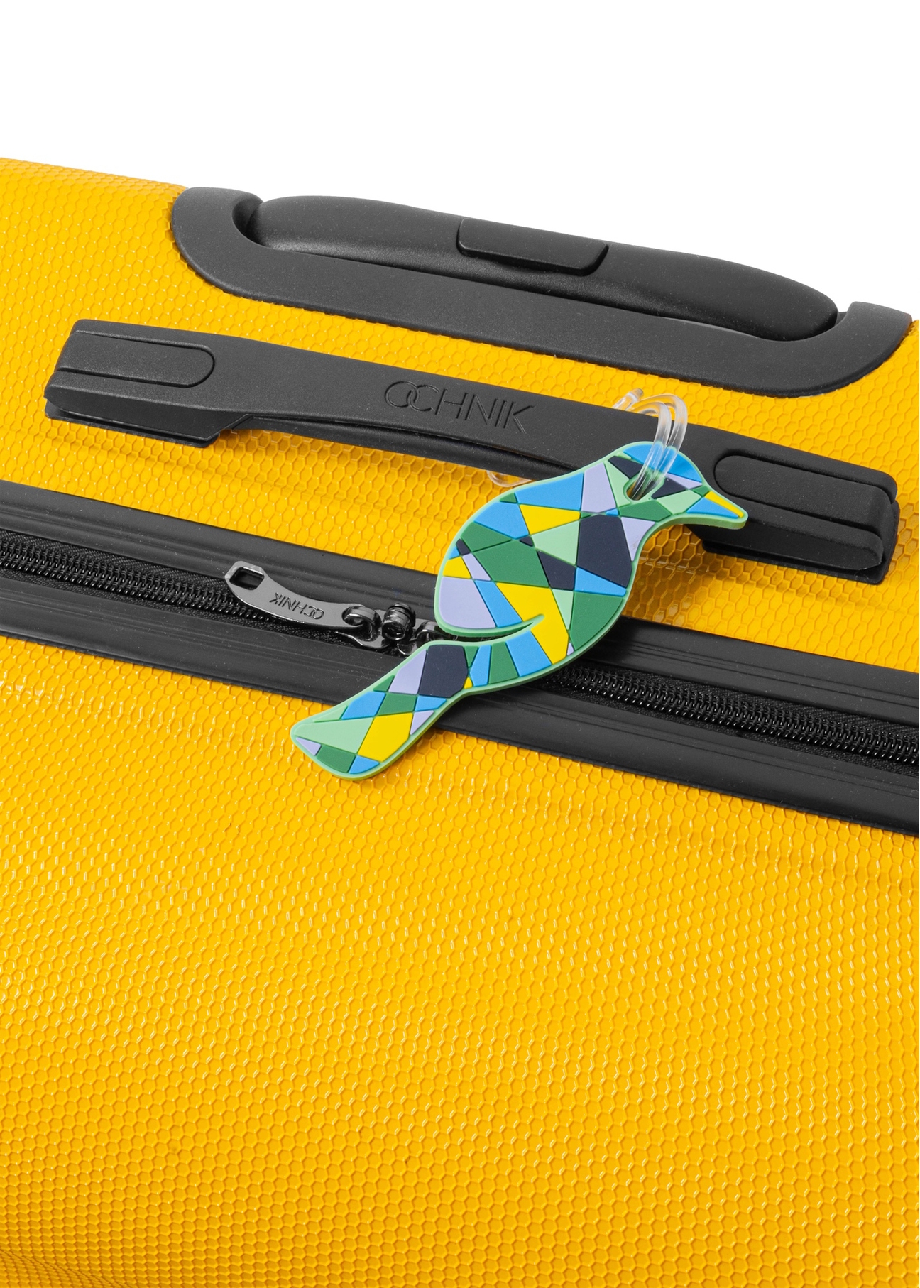 Luggage tag AW-012-0002-63(W25), product view on a suitcase on a white background.
