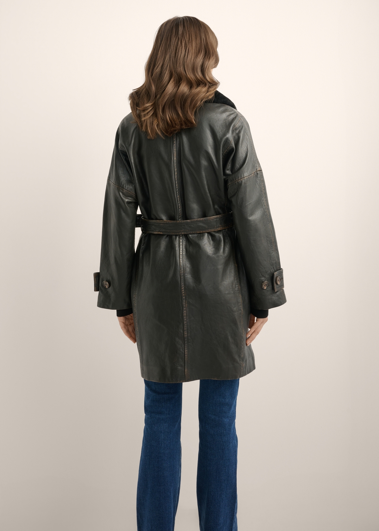Women's dark brown leather jacket KURDS-0559-1I(Z26) - back view of the product, on a model, against a light background. Full body visible.