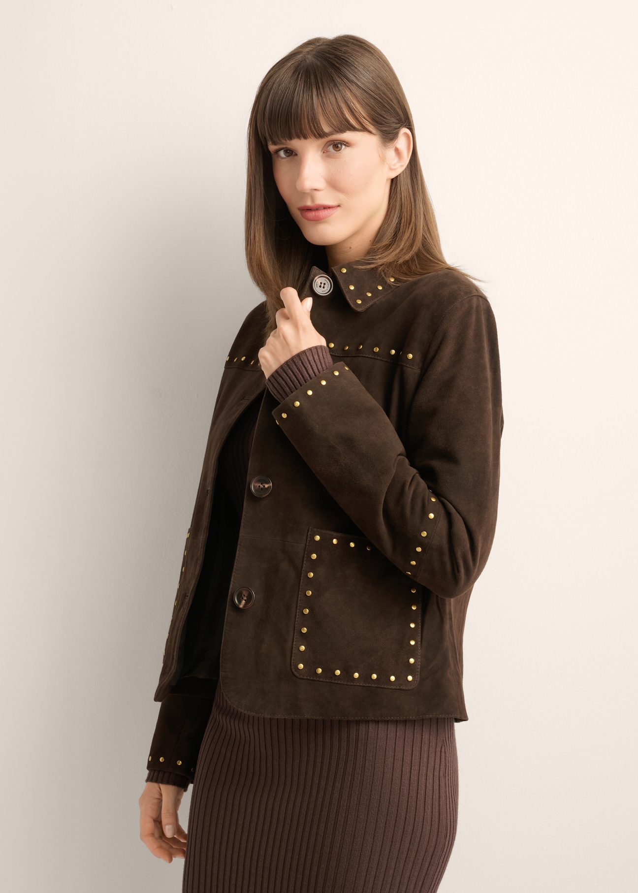 Women's brown suede jacket KURDS-0614-1I(Z26), side view of the product on the model. Half of the silhouette visible.