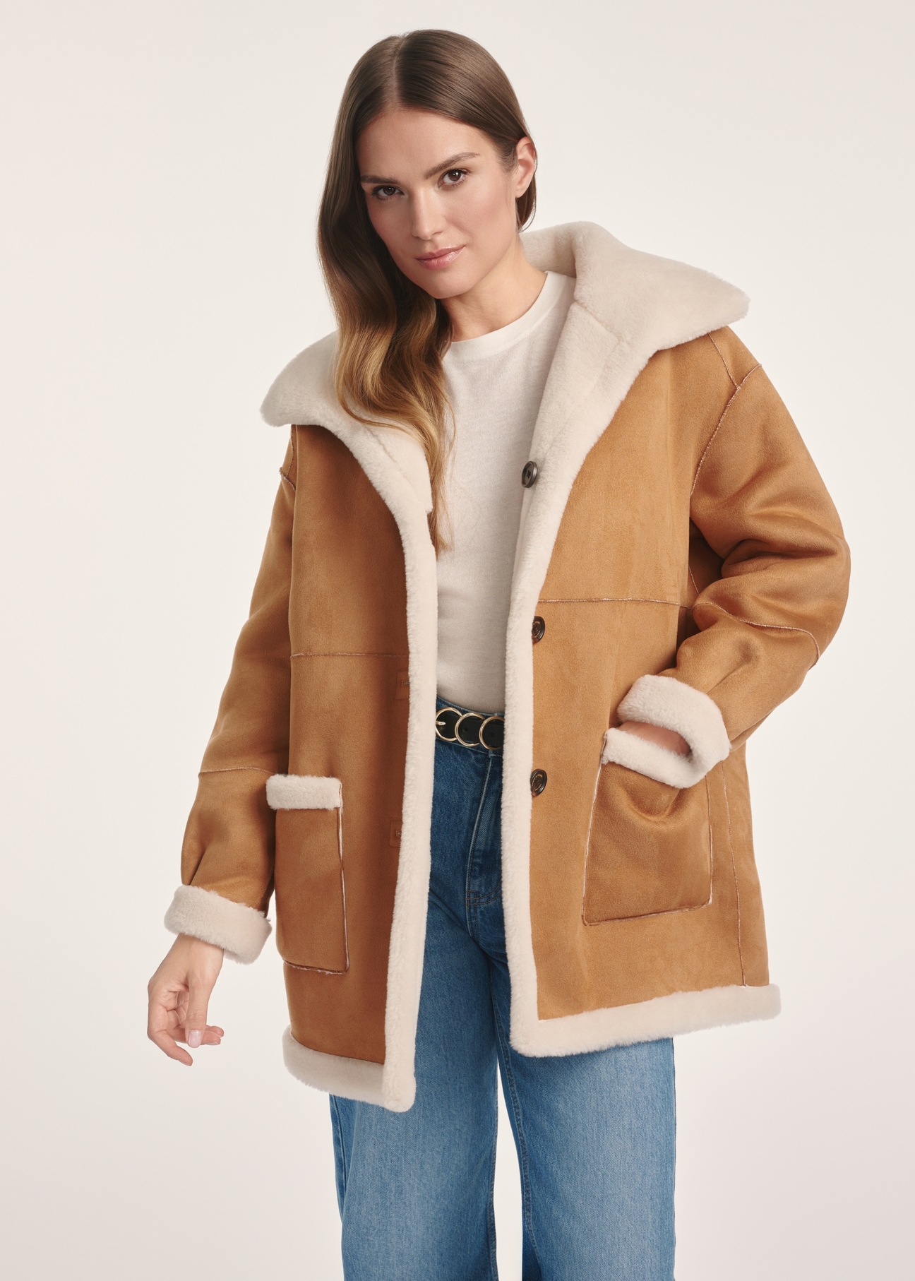 Women's double-sided sheepskin coat KOZDP-0009-24(Z24), product view from the front on a model, half of the silhouette visible.