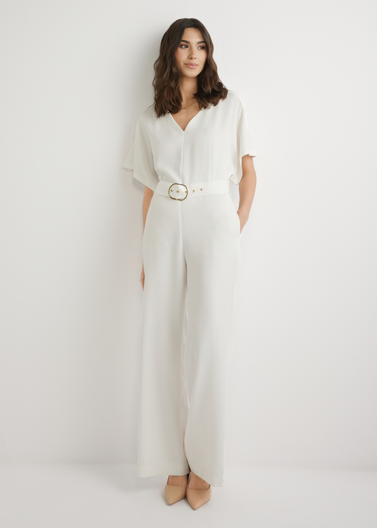 Women's cream jumpsuit KOBDT-0013-0B(W26), front view of the product on the model. Full body visible.