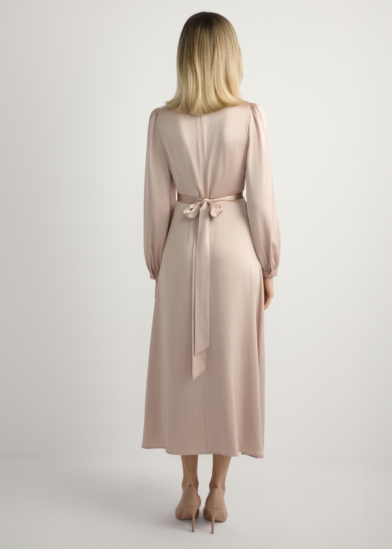 Long beige midi dress SUKDT-0263-1B(W26) - back view of the product on a model, against a light background. The entire silhouette is visible.