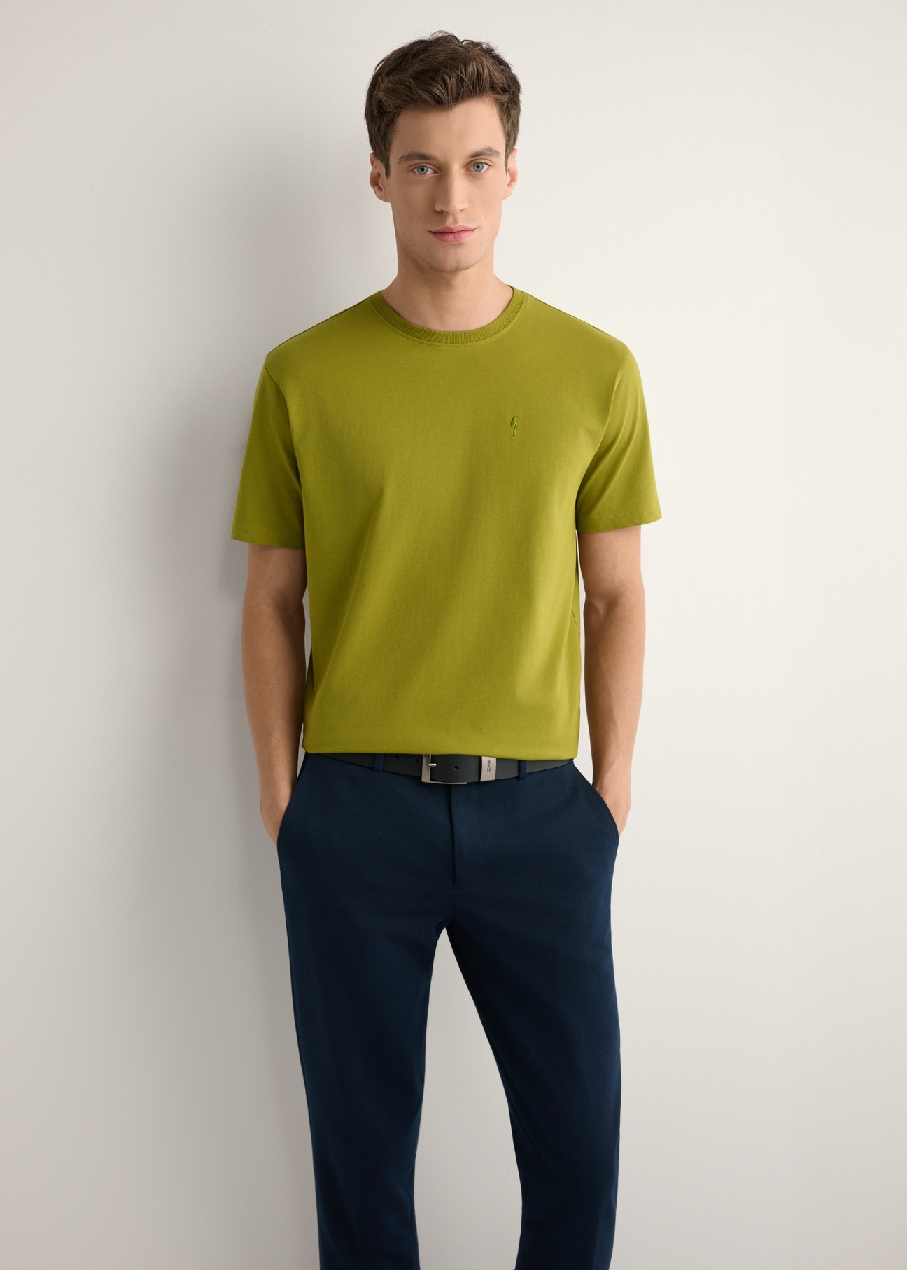 Men's olive T-shirt TSHMT-0120-8E(W26), front view of the product on the model. Half of the silhouette visible.
