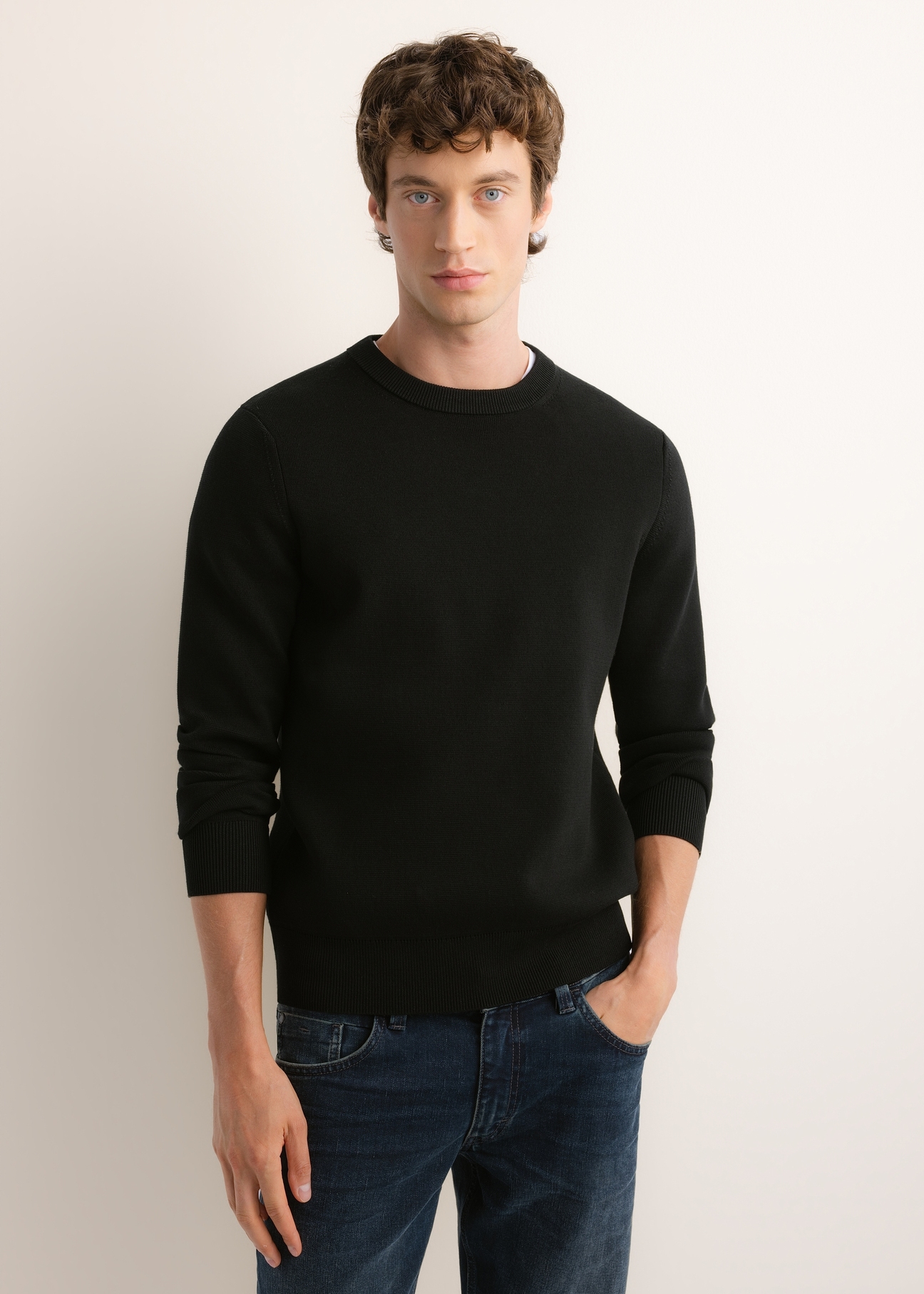 Black men's sweater SWEMT-0217-99(Z26), front product view on the model, on a light background.