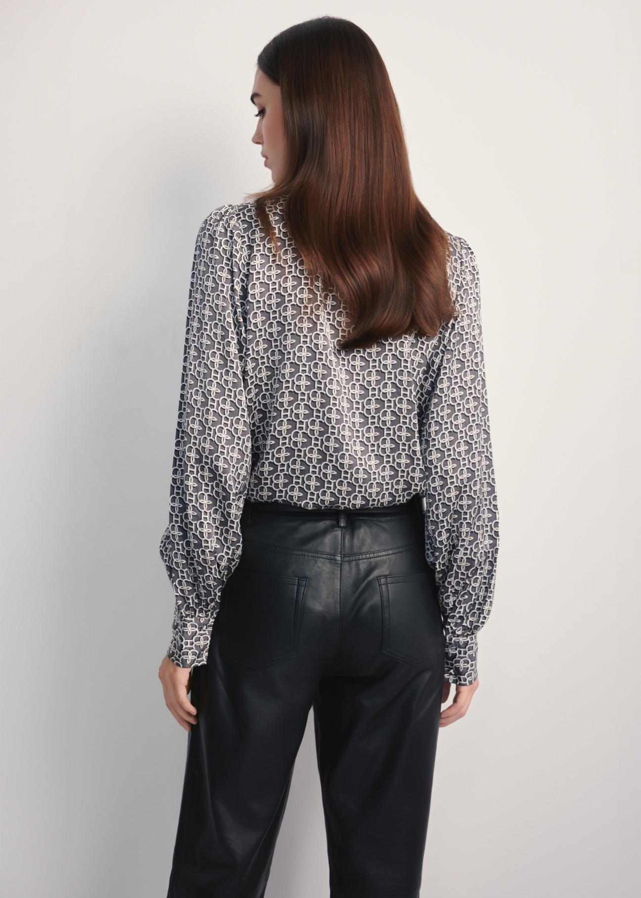 Women's shirt with monogram KOSDT-0175-96(Z25), product view from the back on the model, half of the silhouette visible.
