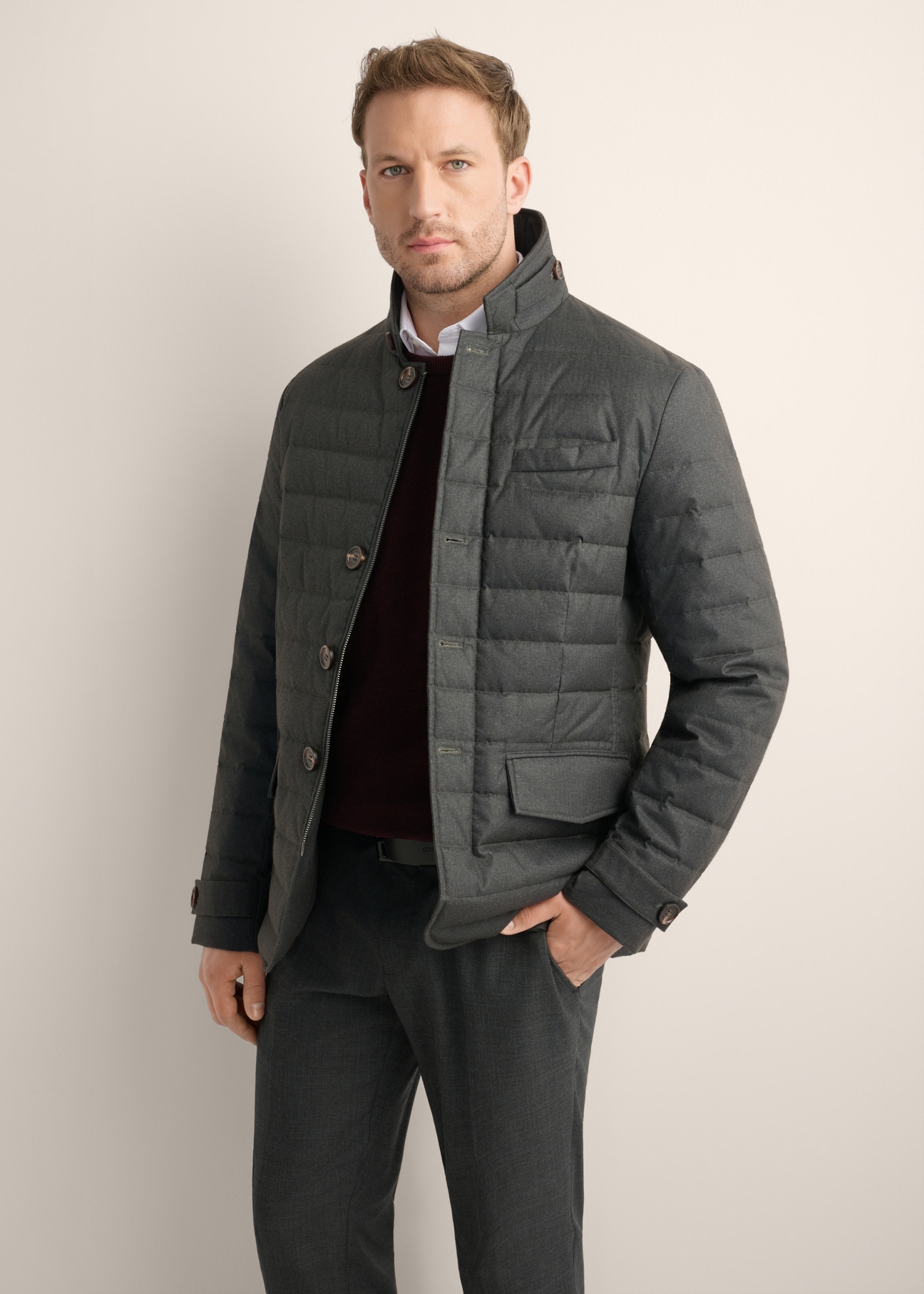 Gray men's jacket with natural insulation KURMT-0424-9C(Z26), front product view on model. Half silhouette visible.