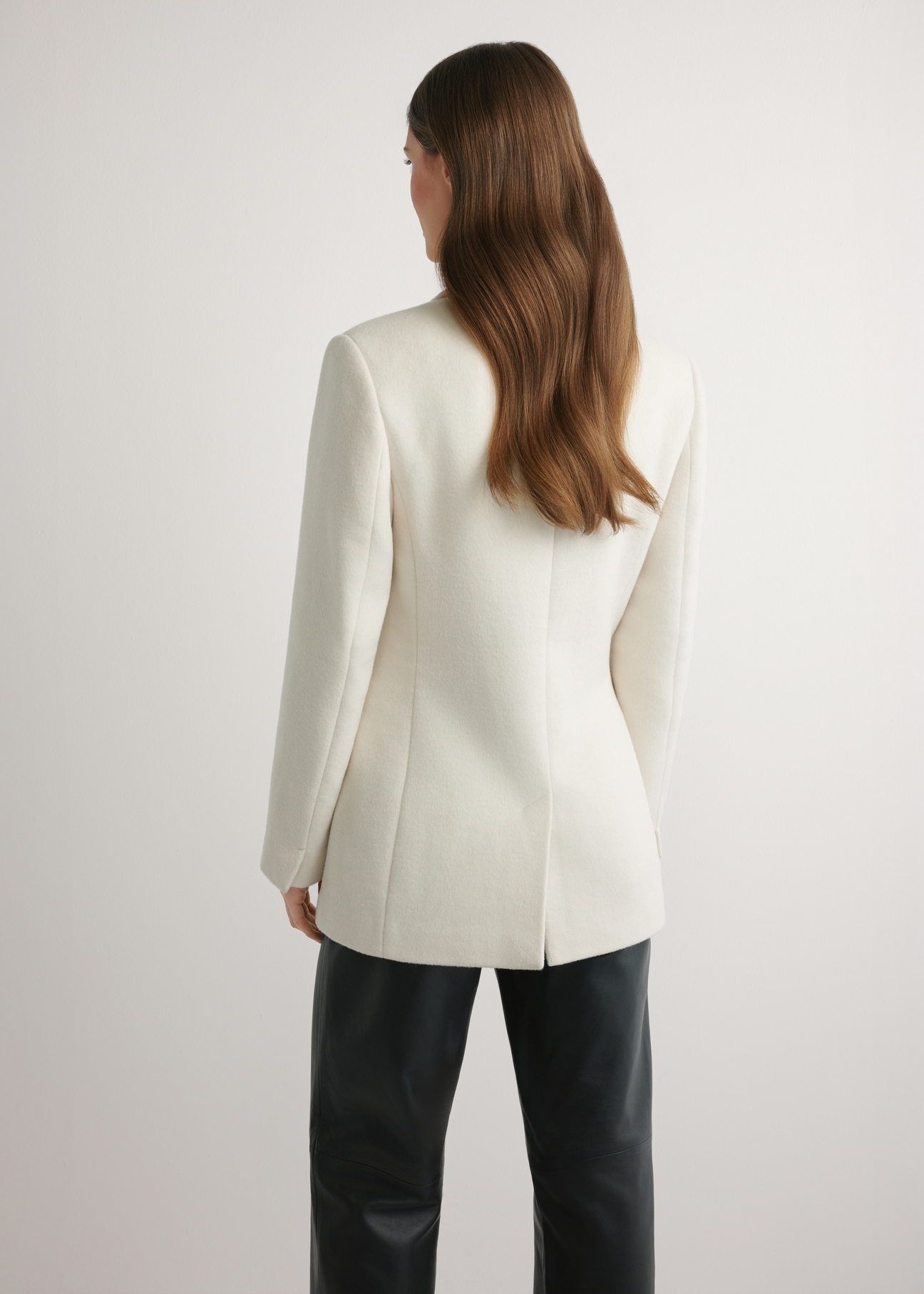 Women's white wool coat PLADT-0072-0B(W26) - back view of the product, on a model against a light background. Half of the silhouette visible.