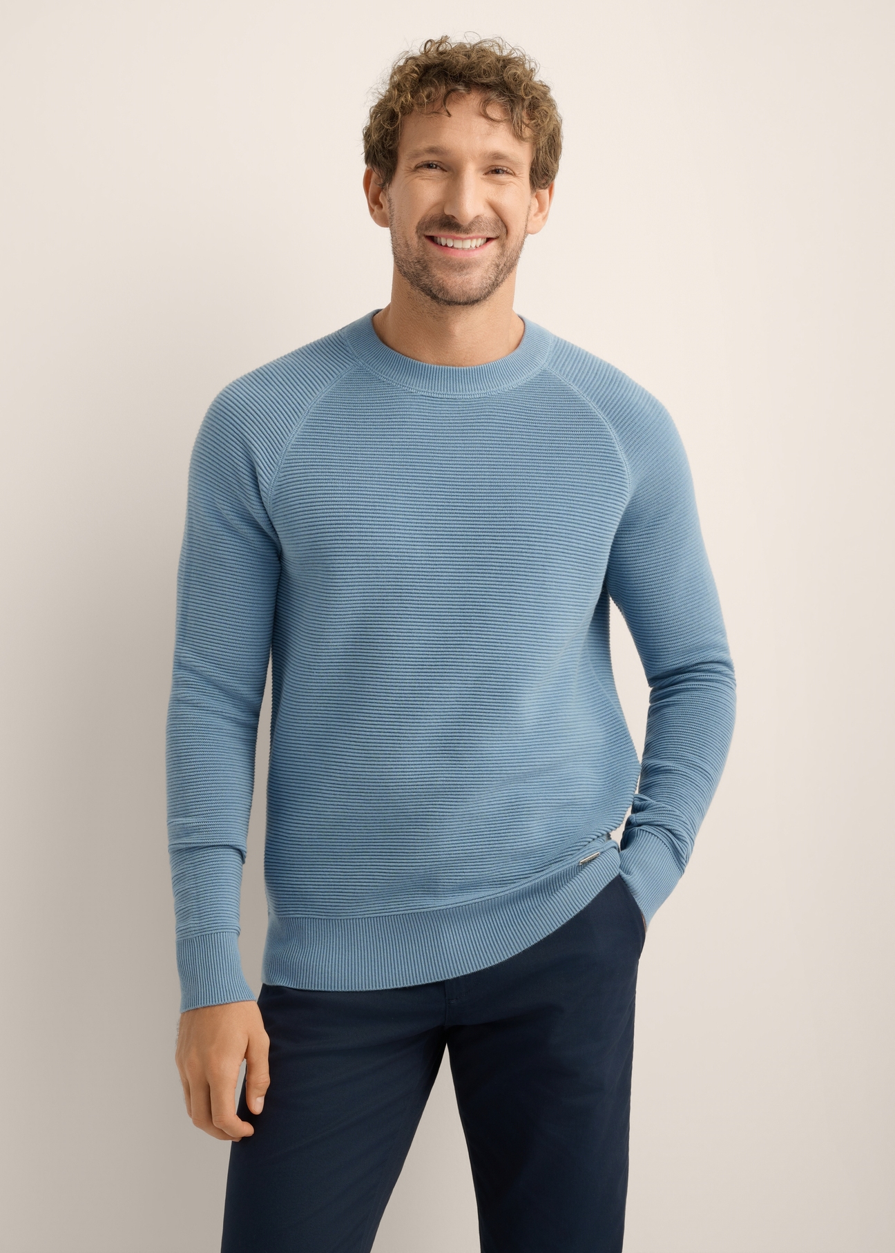 Blue ribbed men's sweater SWEMT-0193-7B(Z26). Front view of the product on a model. Half of the silhouette is visible.