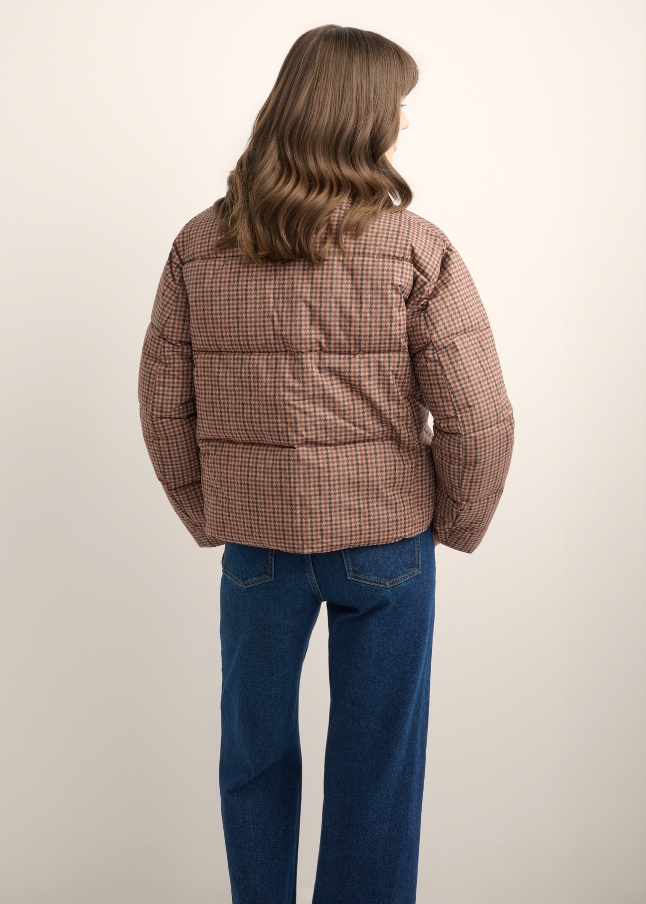 Women's short beige and brown jacket KURDT-0670-1P(Z26), back view of the product on the model. Half of the silhouette visible.