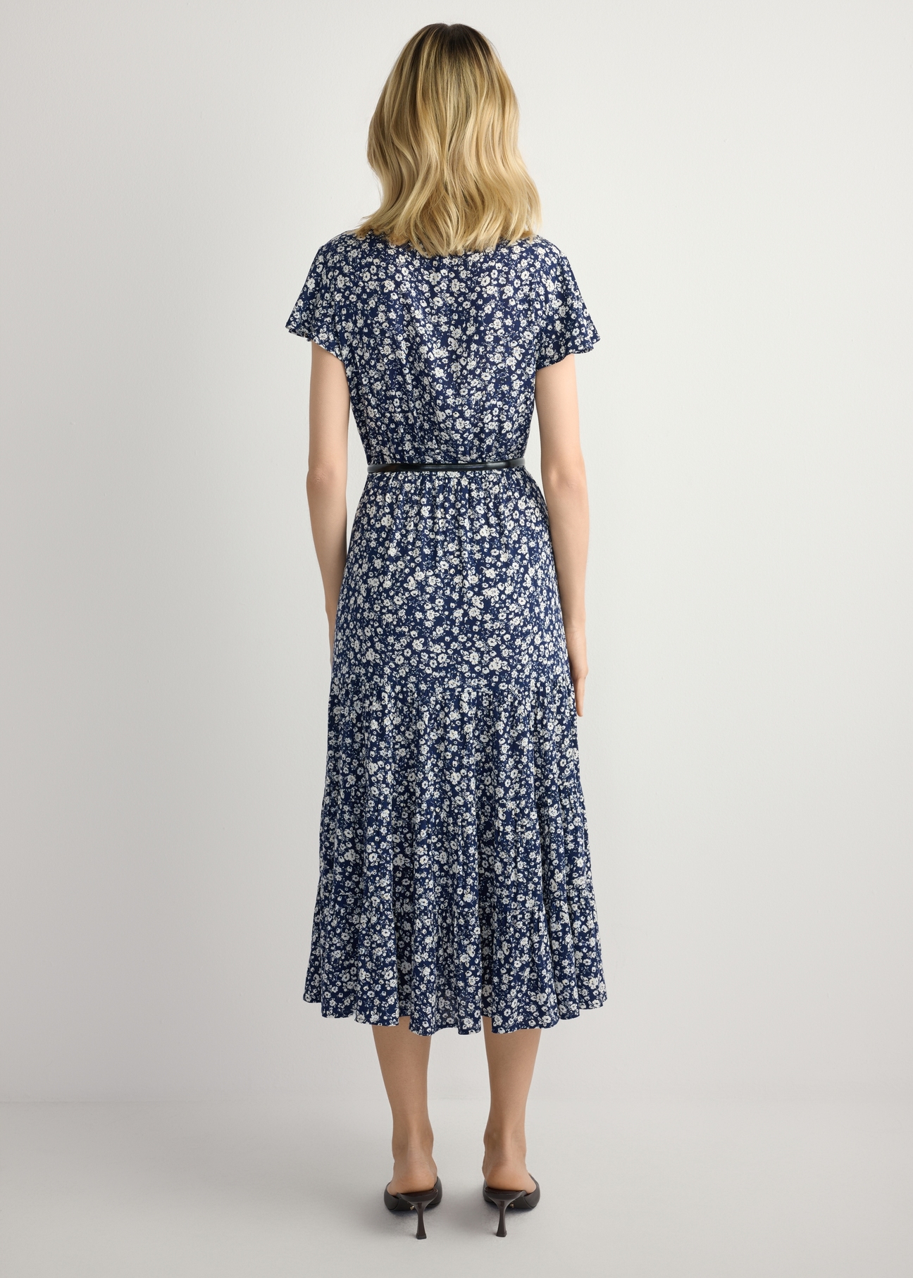 Blue floral midi dress SUKDT-0267-7P(W26), back view of the product on the model. Full body visible.