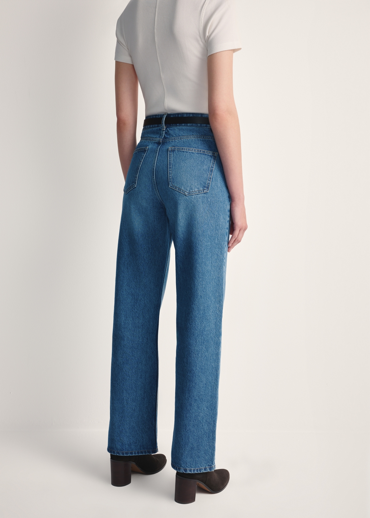 Women's blue denim pants JEADT-0012-61(Z25), back view of the product on the model. Half of the silhouette visible.