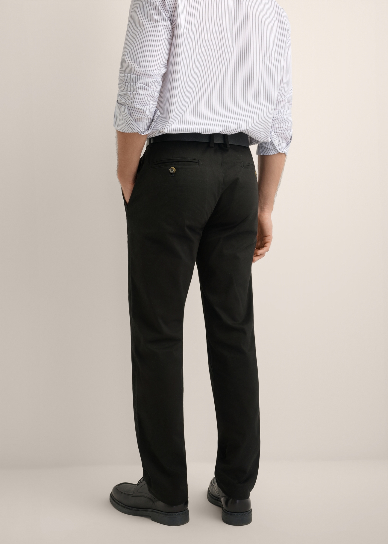 Men's black trousers SPOMT-0121-99(W26), rear view of the product on the model. Half of the silhouette visible.