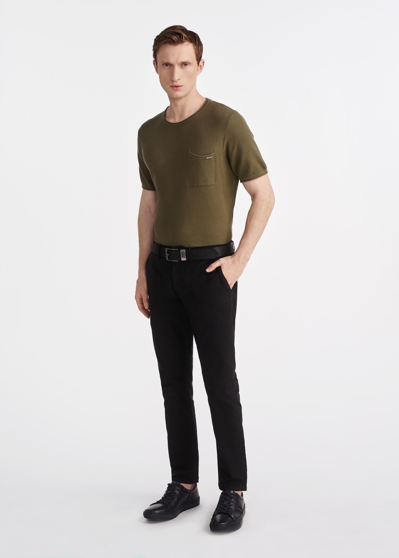 Black men's trousers SPOMT-0103A-99(Z25), front view of the product on the model. The entire silhouette is visible.