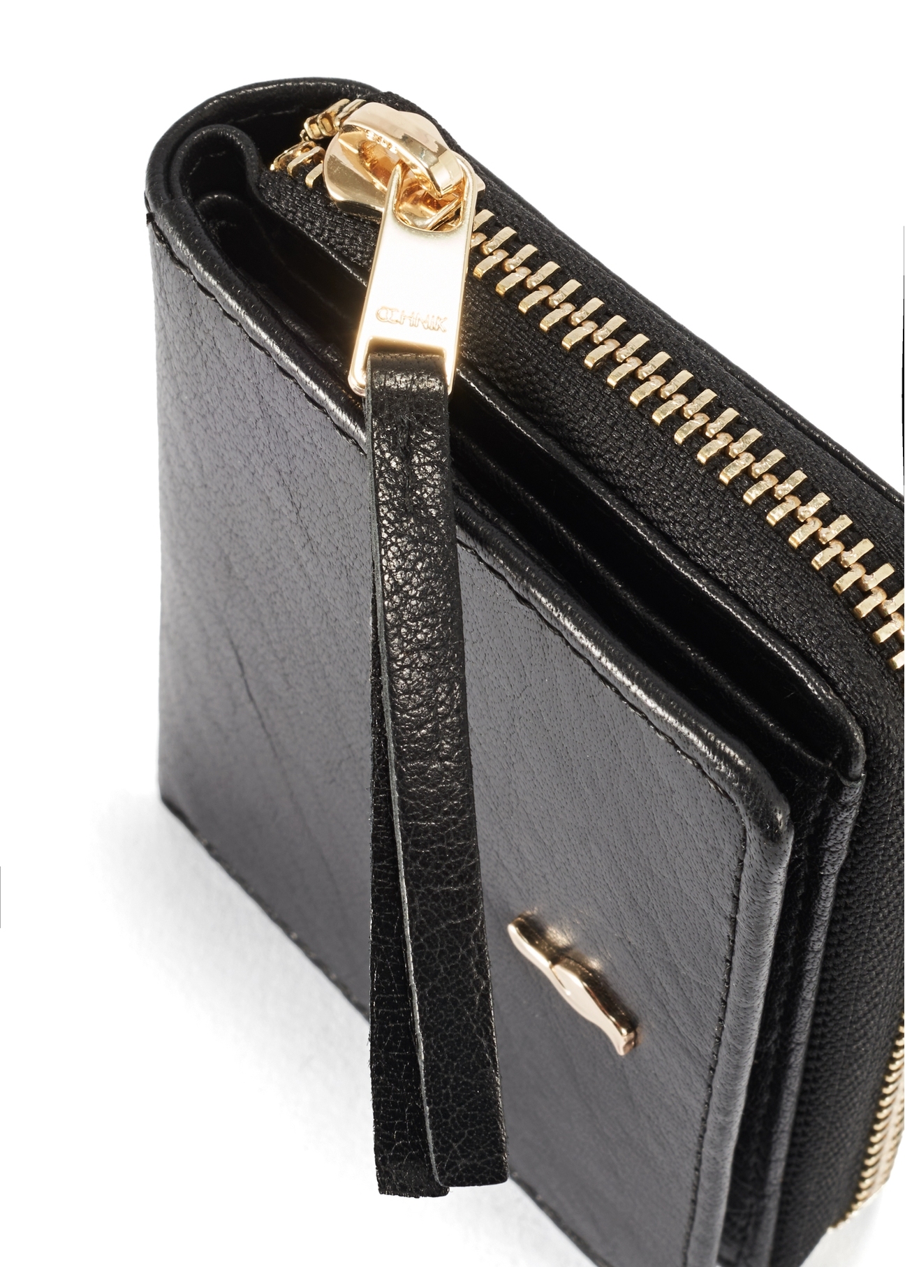 Small women's black leather wallet PORES-0815A-99(Z25), close-up of product detail, view on white background.