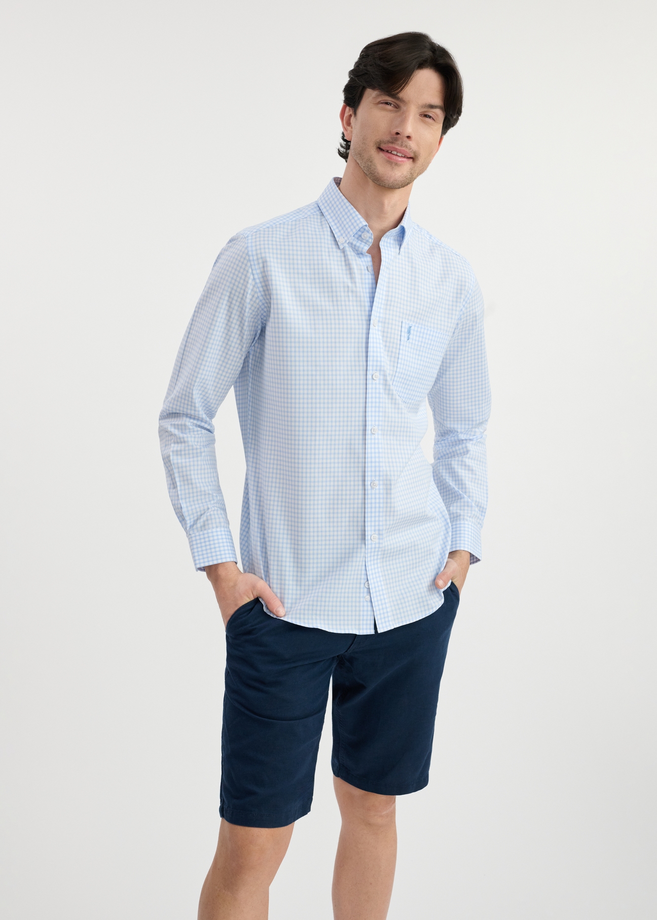 Men's cotton shirt in light blue check KOSMT-0277-63(W25) - front view on model on white background. Half of the silhouette visible.