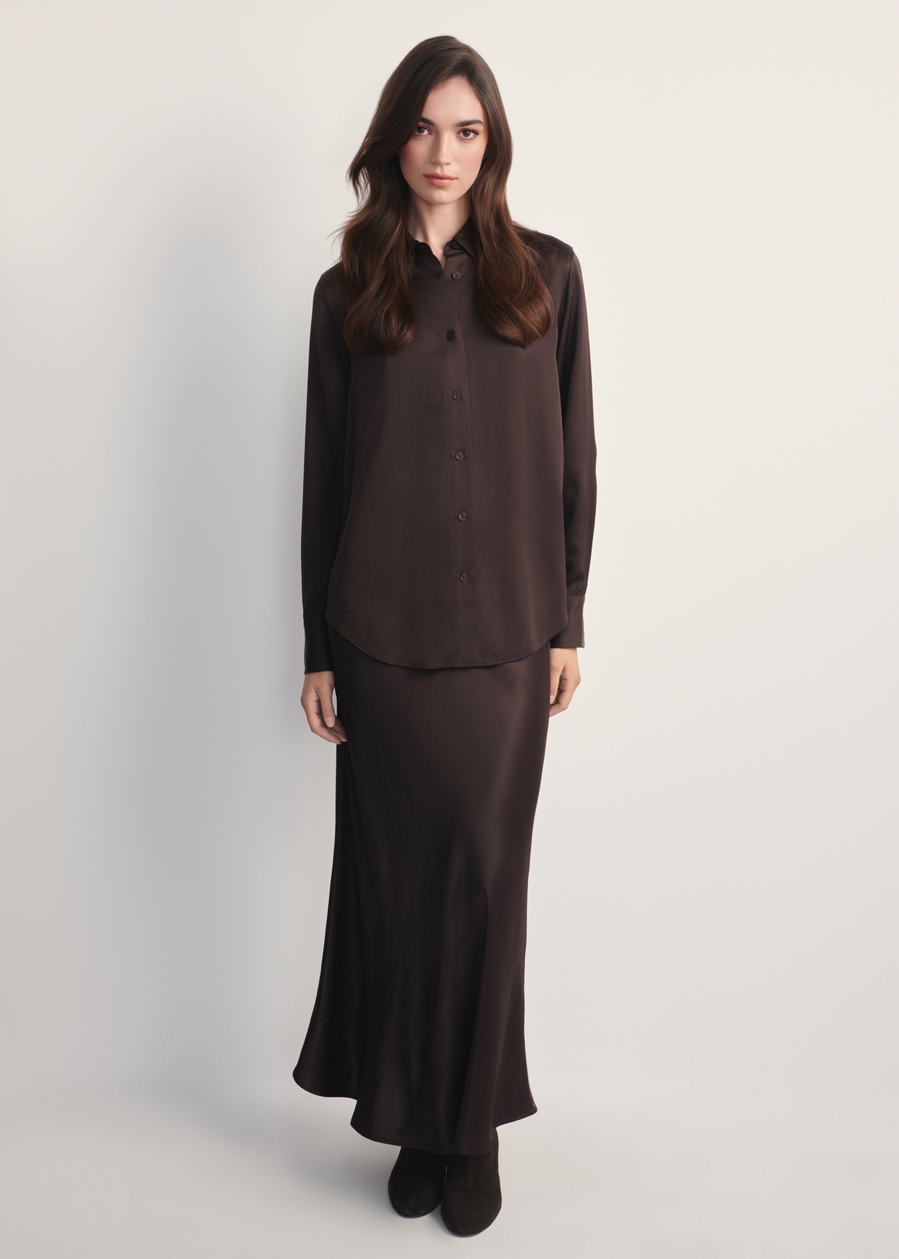Chocolate long women's skirt SPCDT-0117-90(Z25), front view of the product on the model. Full body visible.