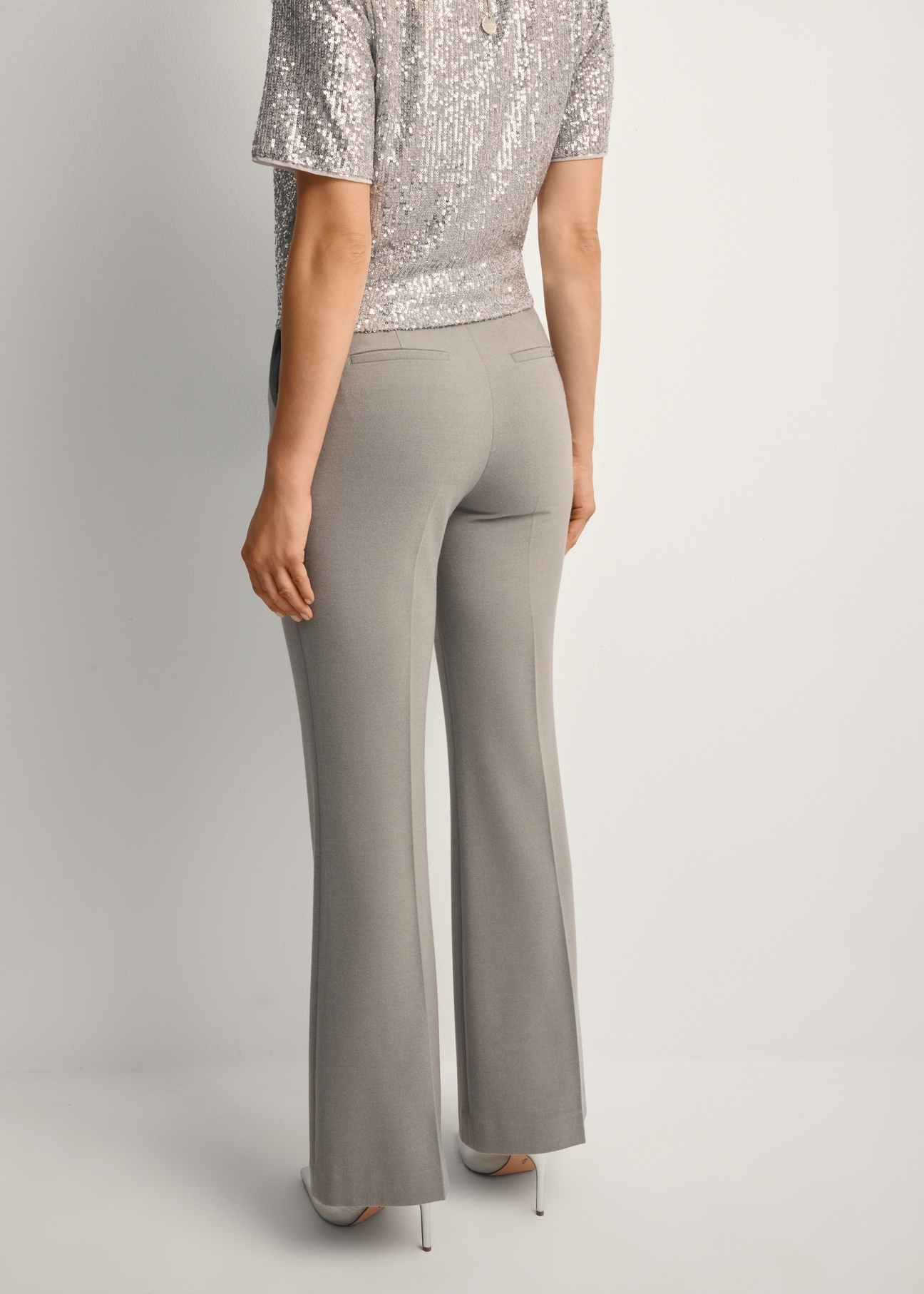 Women's gray trousers SPODT-0113-91(Z25), back view of the product on the model. Half of the silhouette visible.