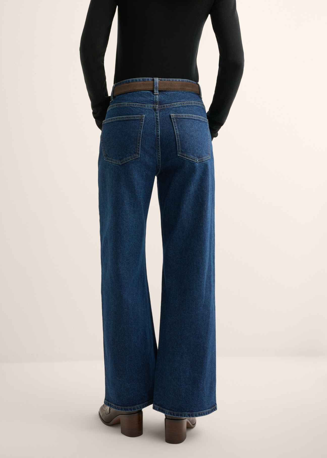 Women's navy blue denim pants JEADT-0013-7D(Z26) - back view of the product, on a model, against a light background. Half of the silhouette visible.