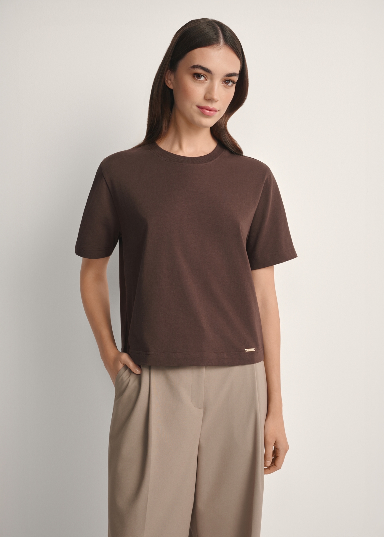 Women's brown cotton T-shirt TSHDT-0138-1I(W26), front view of the product on the model, half of the silhouette visible.