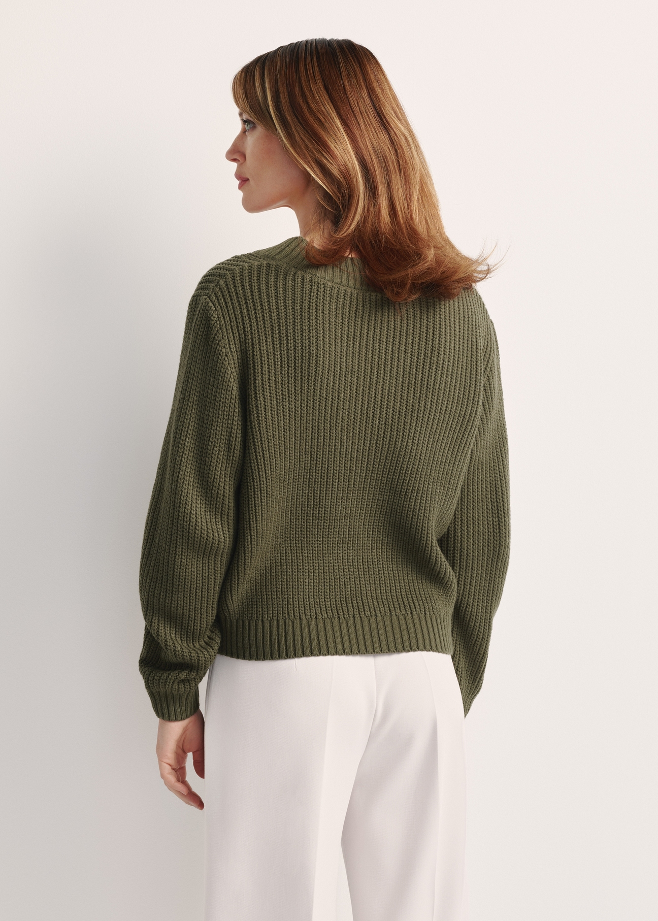 Women's khaki sweater SWEDT-0162-55(Z25), product visible from the back on the model, half of the silhouette visible.