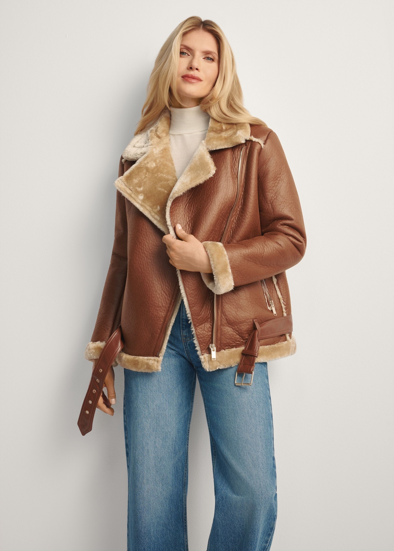 Camel short women's sheepskin coat KOZDP-0001A-1D(Z26), front view of the product on the model, half of the silhouette visible.