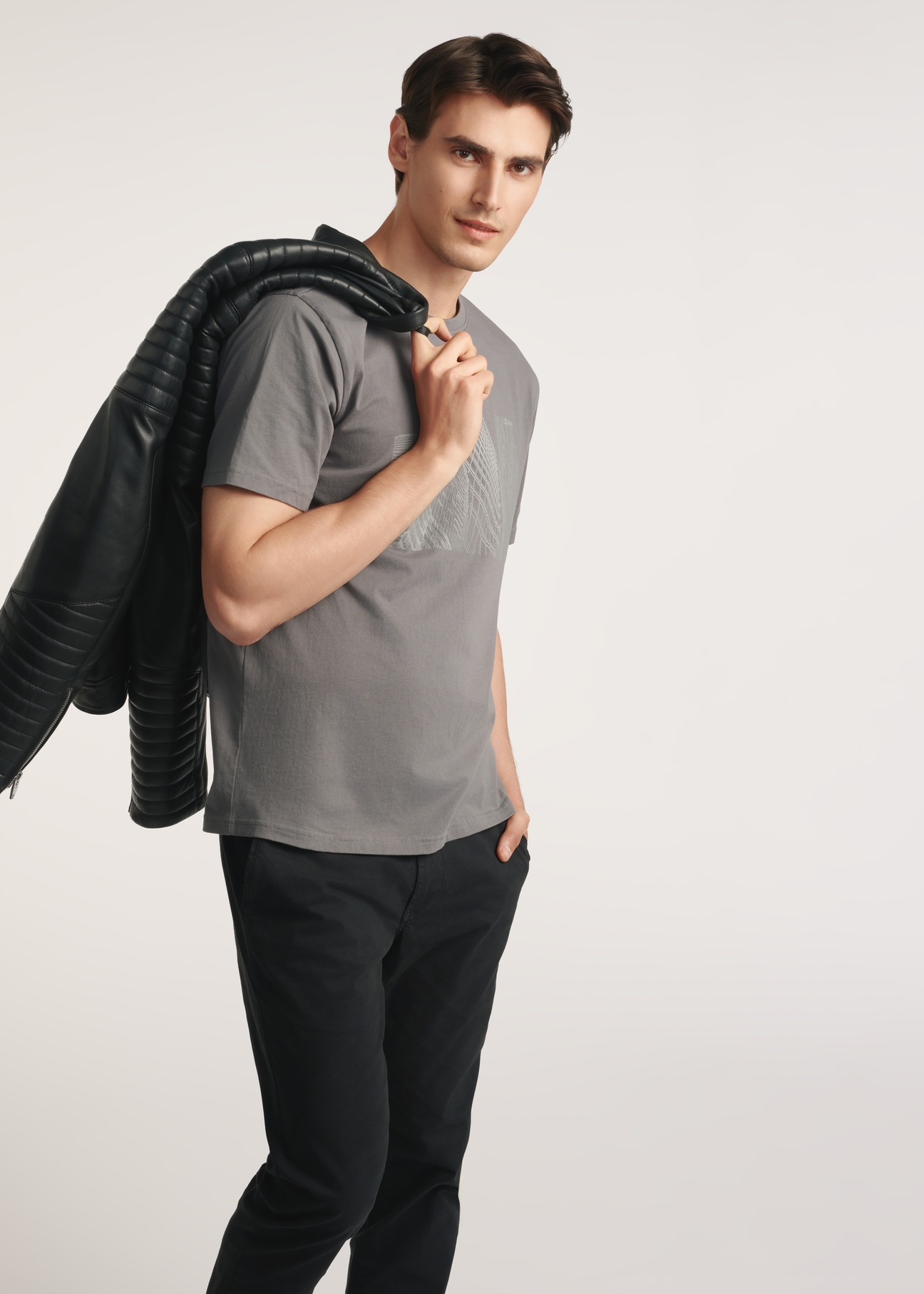 Gray men's T-shirt with print TSHMT-0131-96(Z25) - side view of the product on a model on a white background. Visible silhouette.