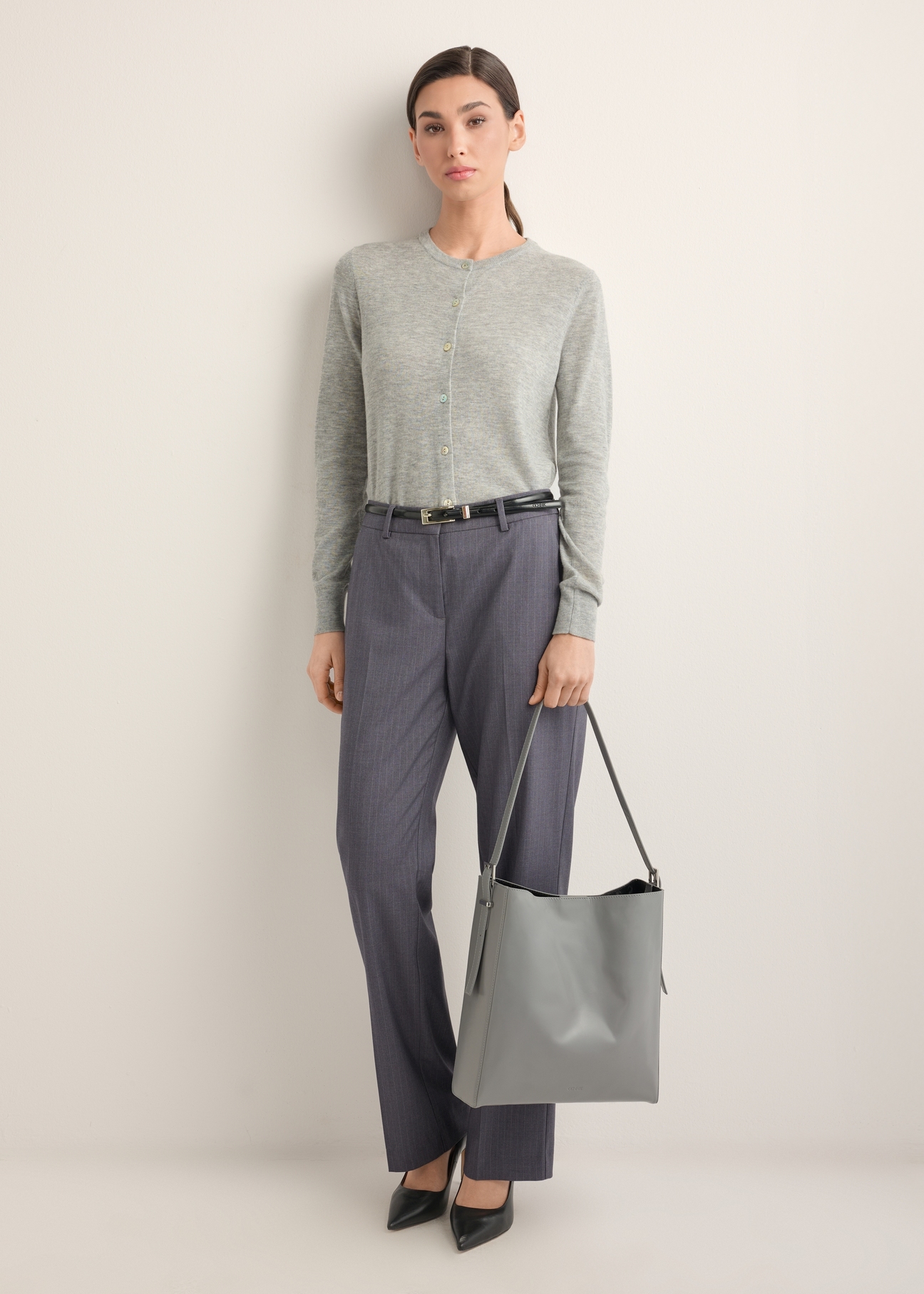 Graphite leather shopper bag TORES-1436-9D(Z26), product view in model's hand. Full body visible.