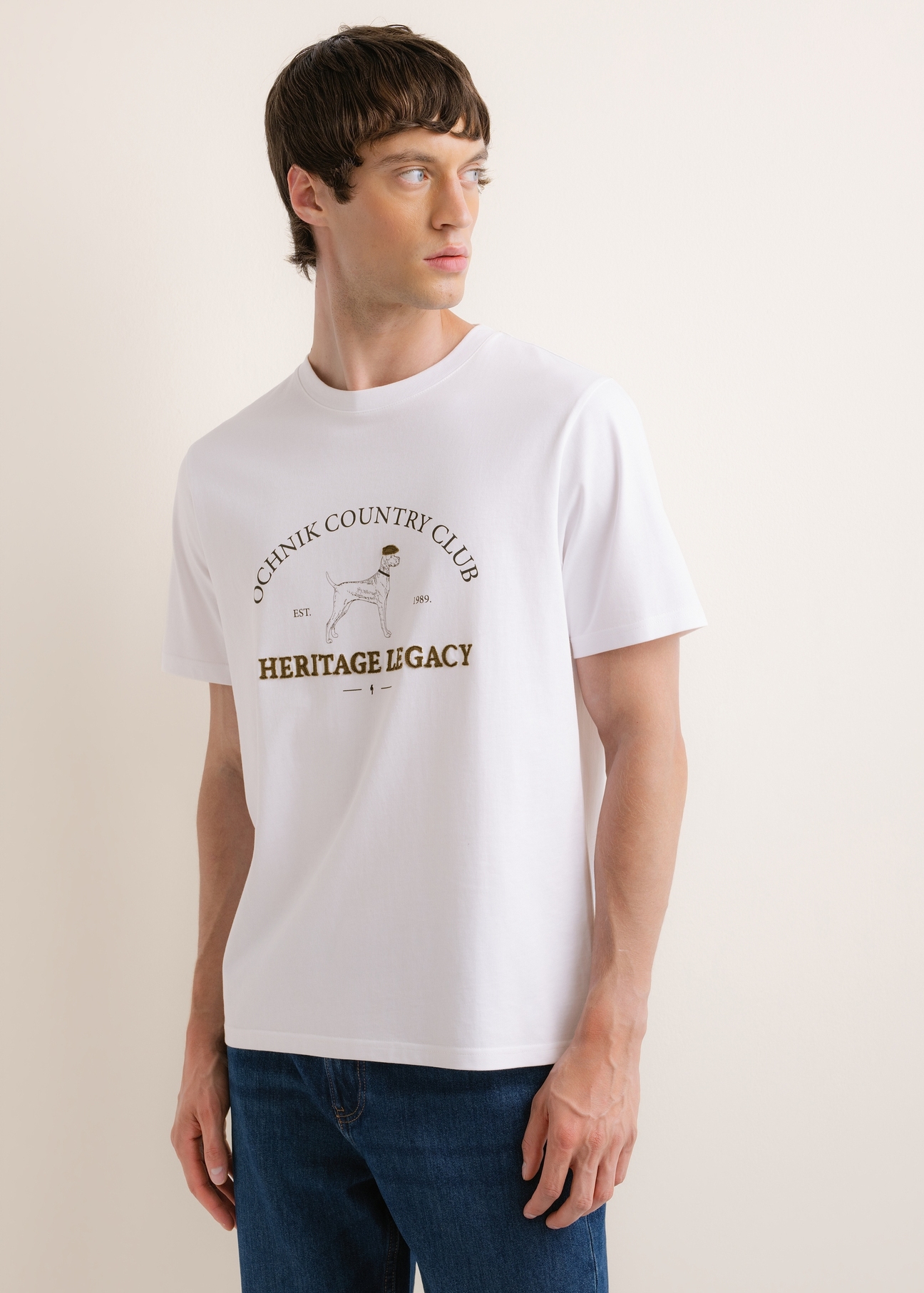 White cotton men's T-shirt TSHMT-0161-0A(Z26), front view of the product on the model. Half of the silhouette visible.