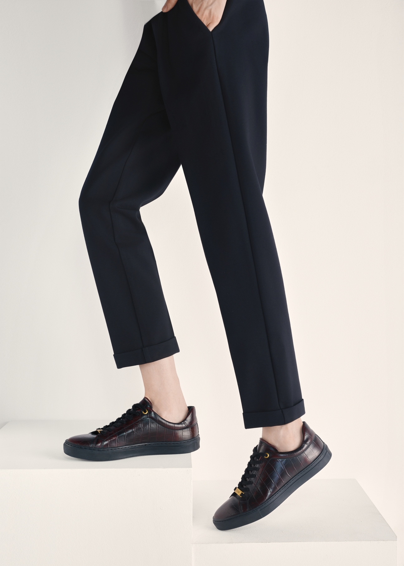 Women's leather shoes in burgundy color BUTYD-1188-09(Z25), view of the product on the model's feet against a light background.
