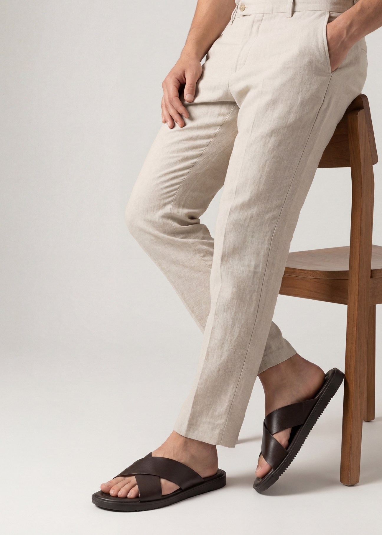 Men's dark brown leather slides BUTYM-0536-1I(W26), side view of the product on the model's feet.