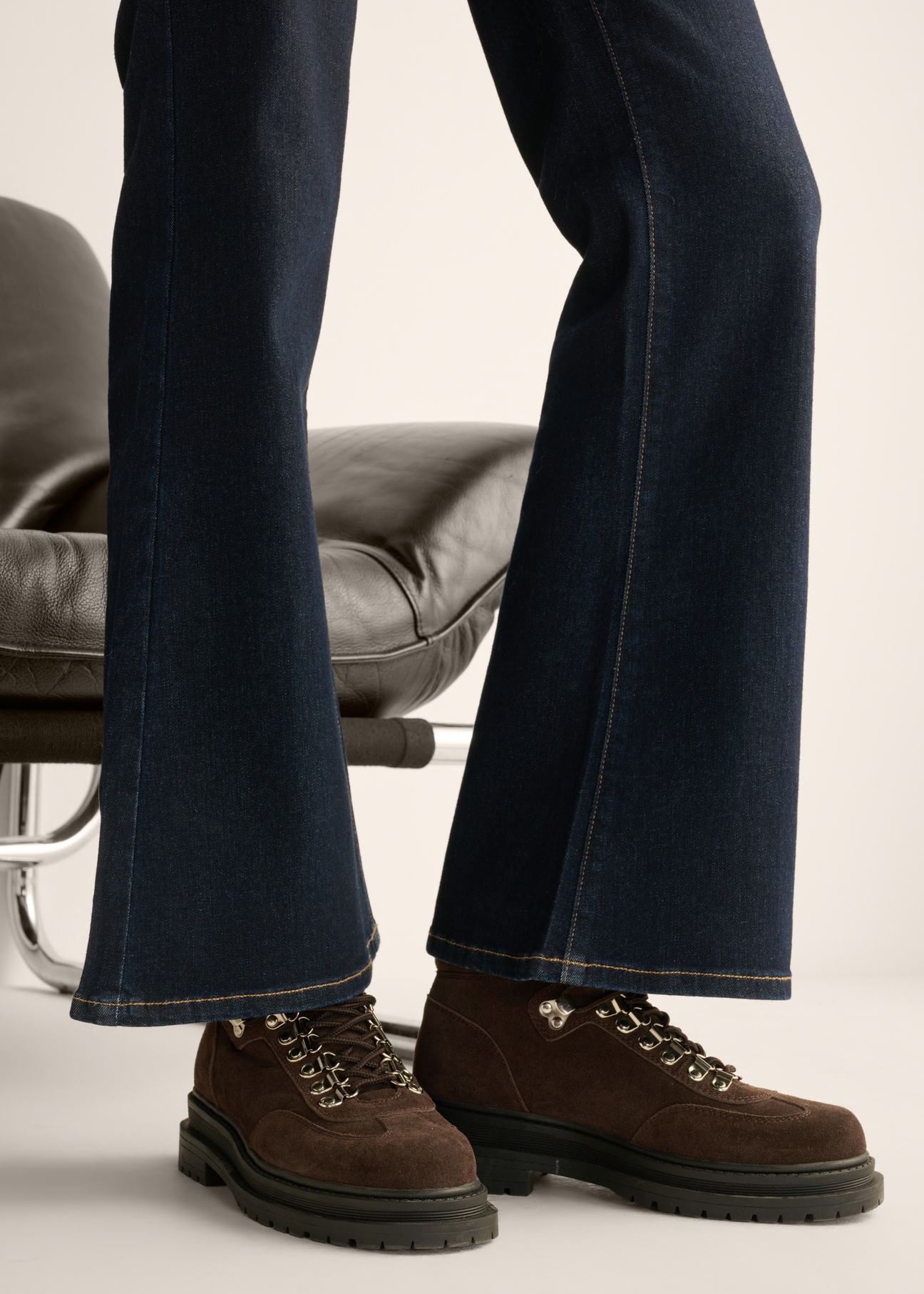 Women's dark brown suede ankle boots BUTYD-1354-1I(Z26), side view of the product on the model's feet, on a light background.