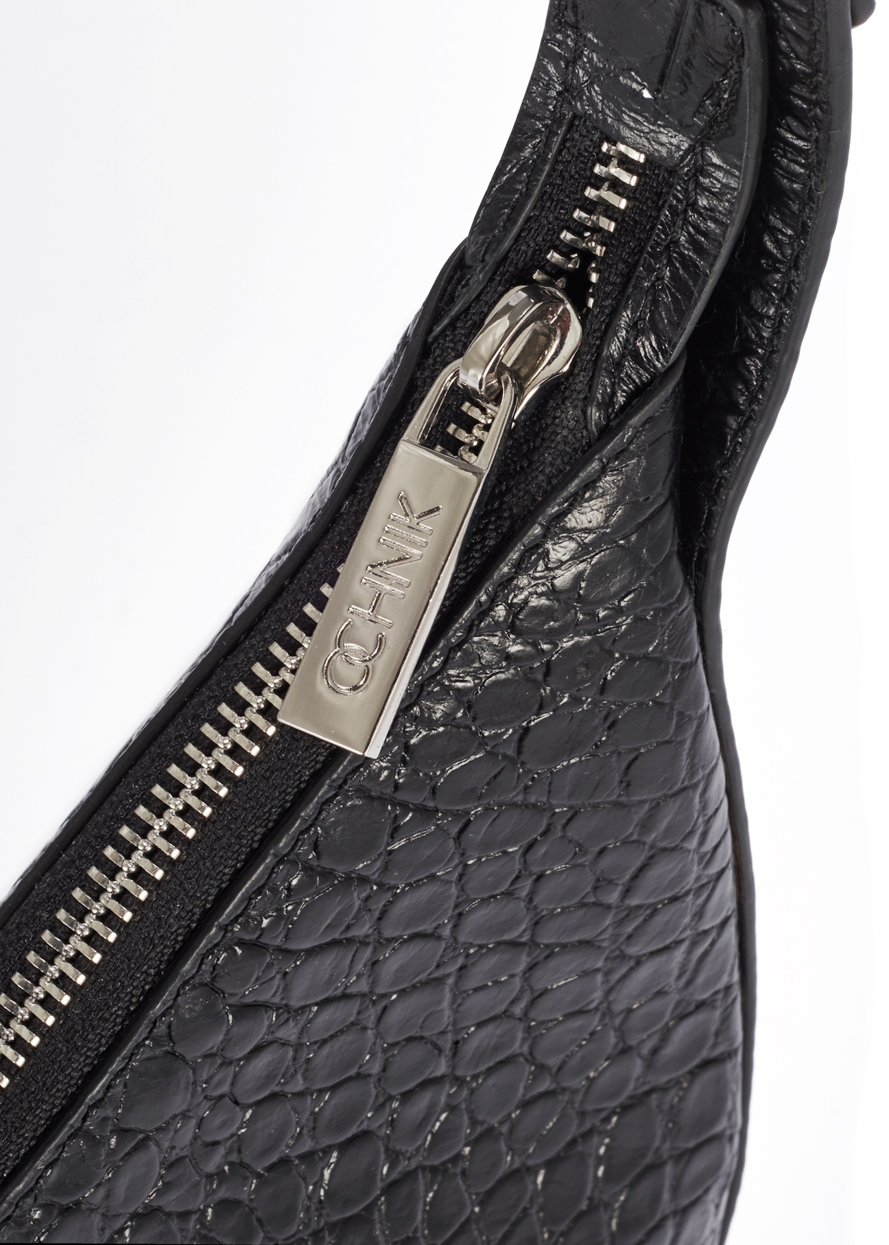 Black leather croco handbag TORES-1172-99(Z25) - close-up of detail on white background.