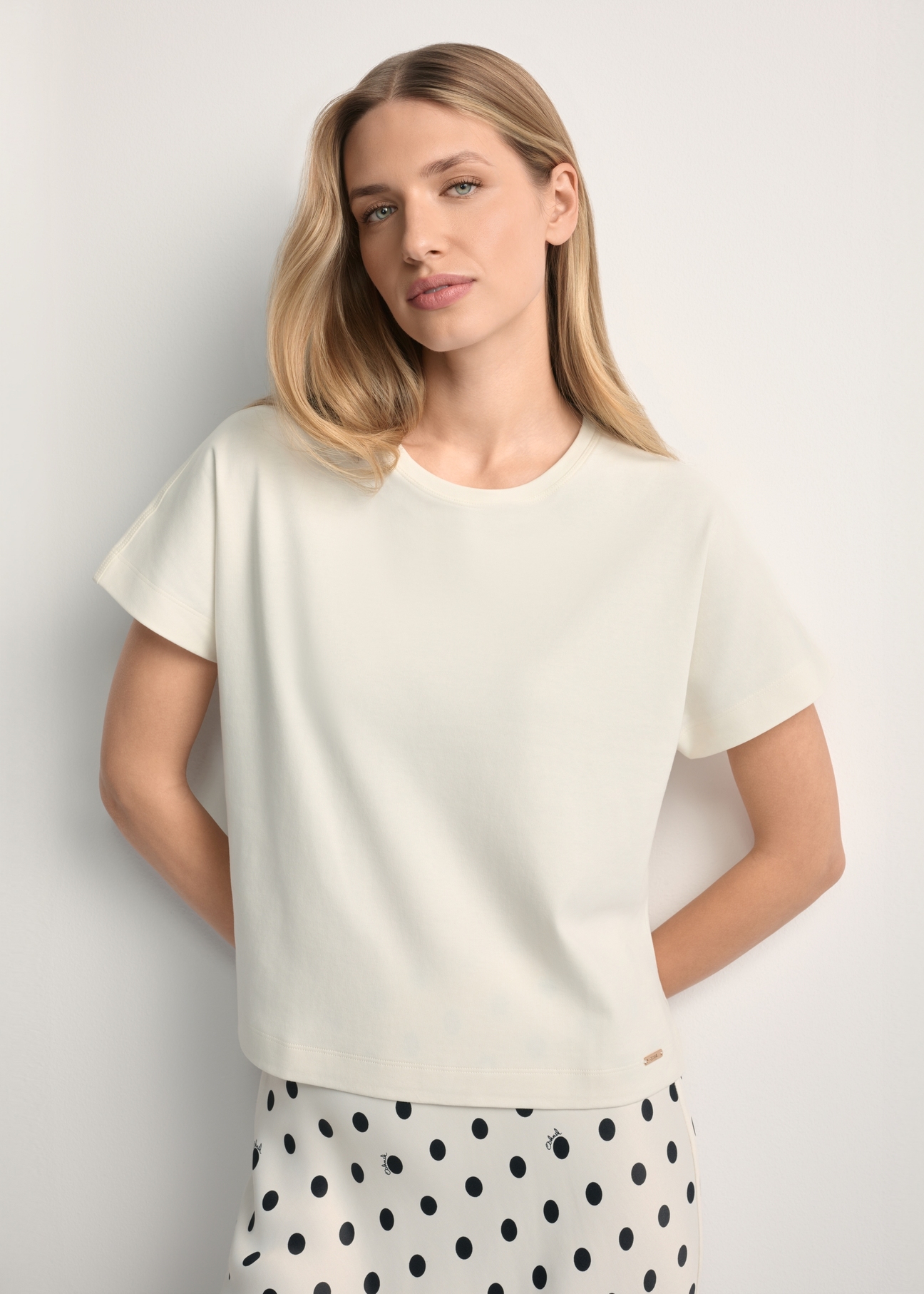 Cream women's mercerized cotton T-shirt TSHDT-0154-0B(W26) - front view of the product, against a light background. Half of the silhouette visible.