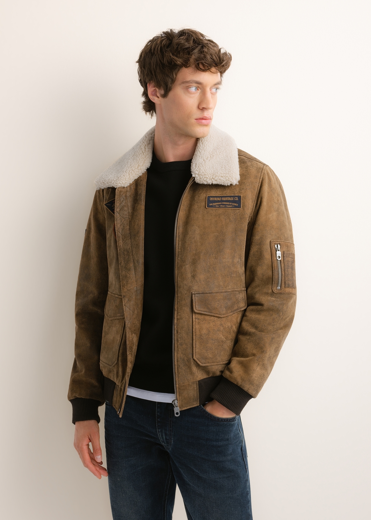 Men's suede bomber jacket KURMS-0422-1C(Z26), front product view on model. Half silhouette visible.