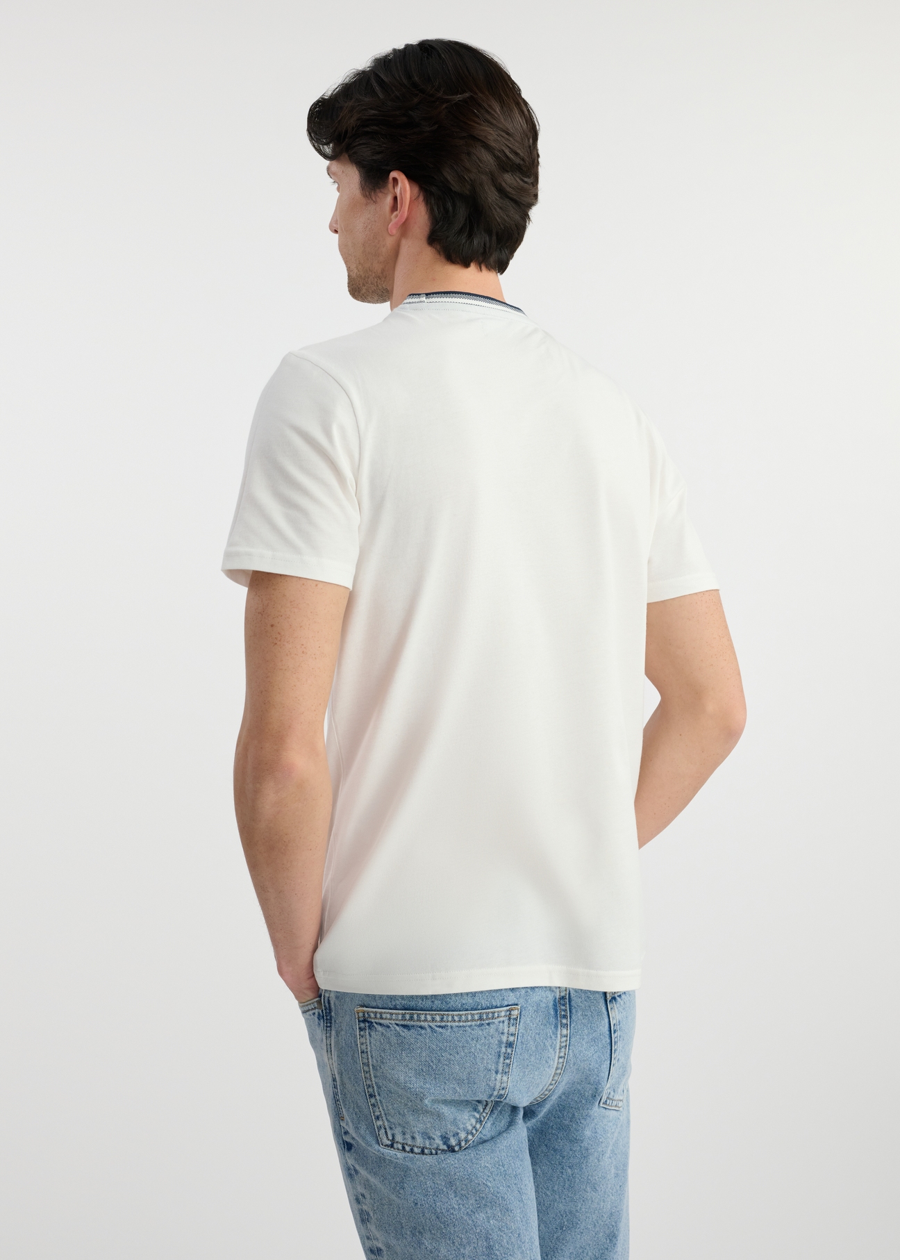Men's white cotton T-shirt TSHMT-0123-12(W25), product view from the back on the model. The entire silhouette is visible.