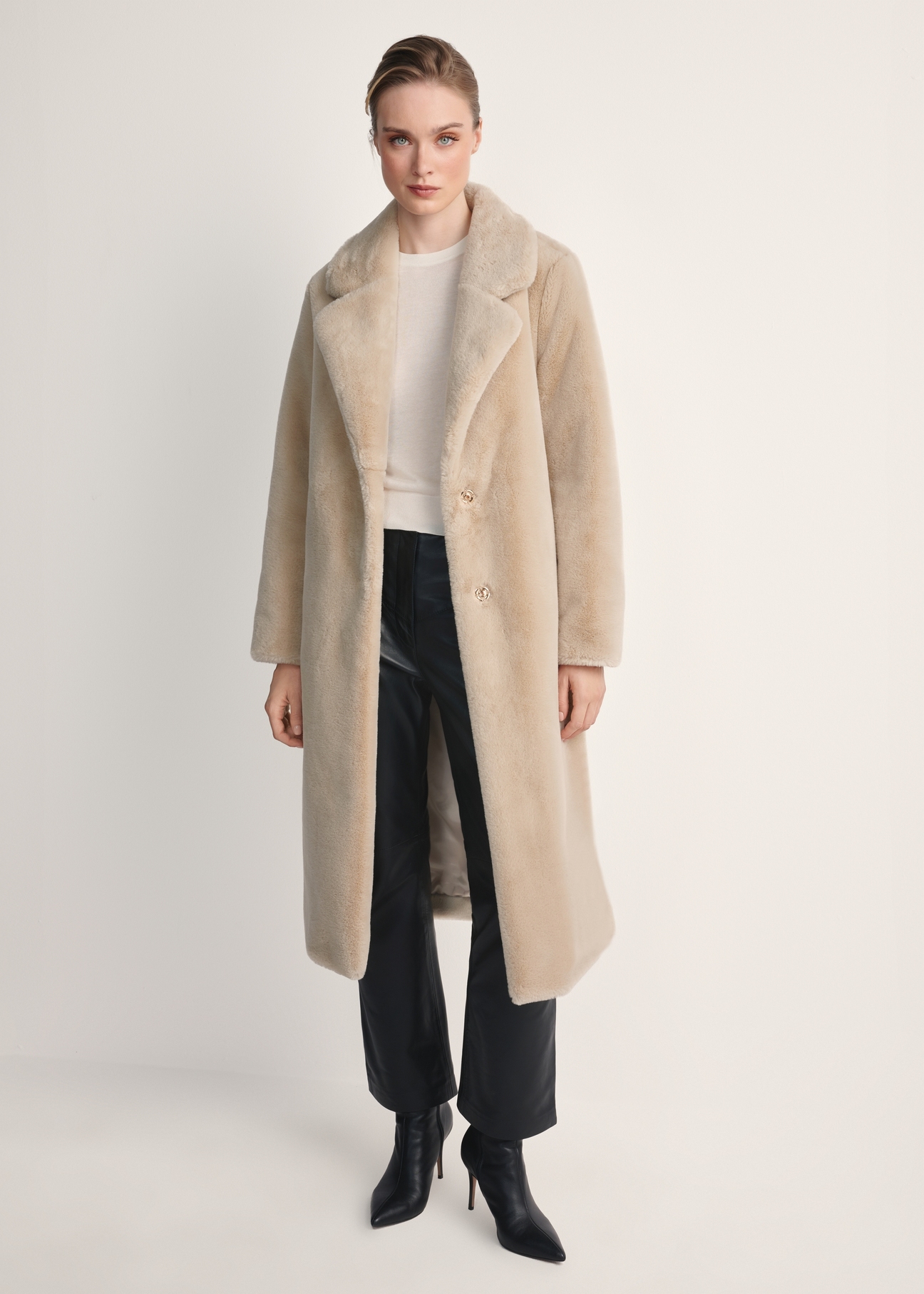 Women's faux fur coat with belt FUTDP-0002A-81(Z24), product visible from the front on the model, the entire silhouette is visible.