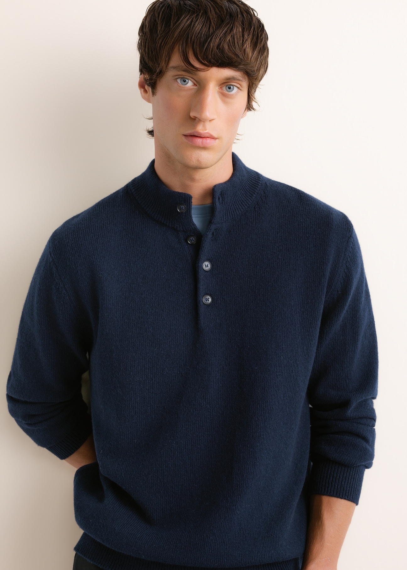 Men's dark navy blue sweater with a wool blend (SWEMT-0215-7E(Z26)); front view of the product on a model. Half of the figure is visible.
