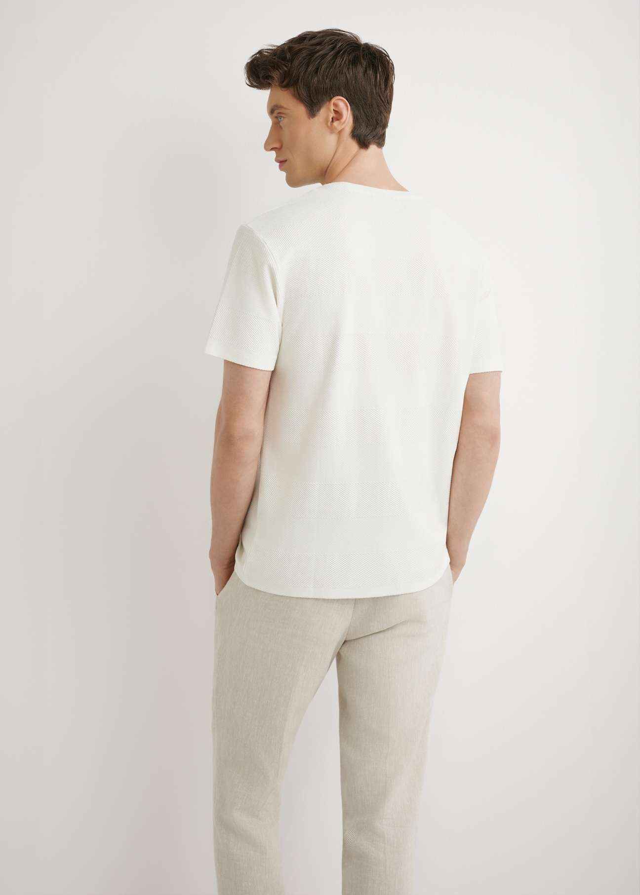 Cream men's ribbed t-shirt TSHMT-0142-0B(W26) - back view of the product, on a model, against a light background. Half-length silhouette visible.