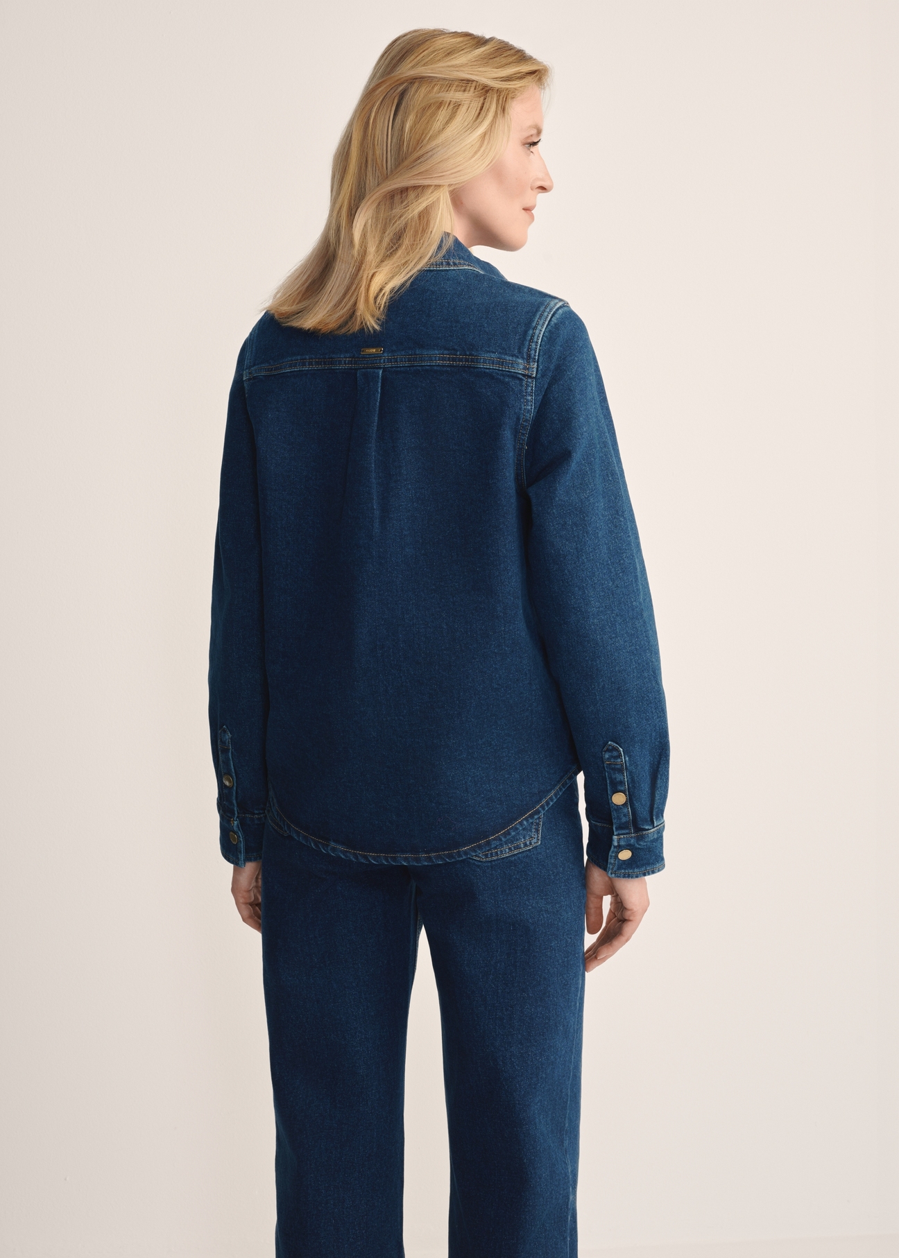 Navy blue denim women's shirt KOSDT-0170-69(Z25), back view of the product on the model. Half of the silhouette visible.